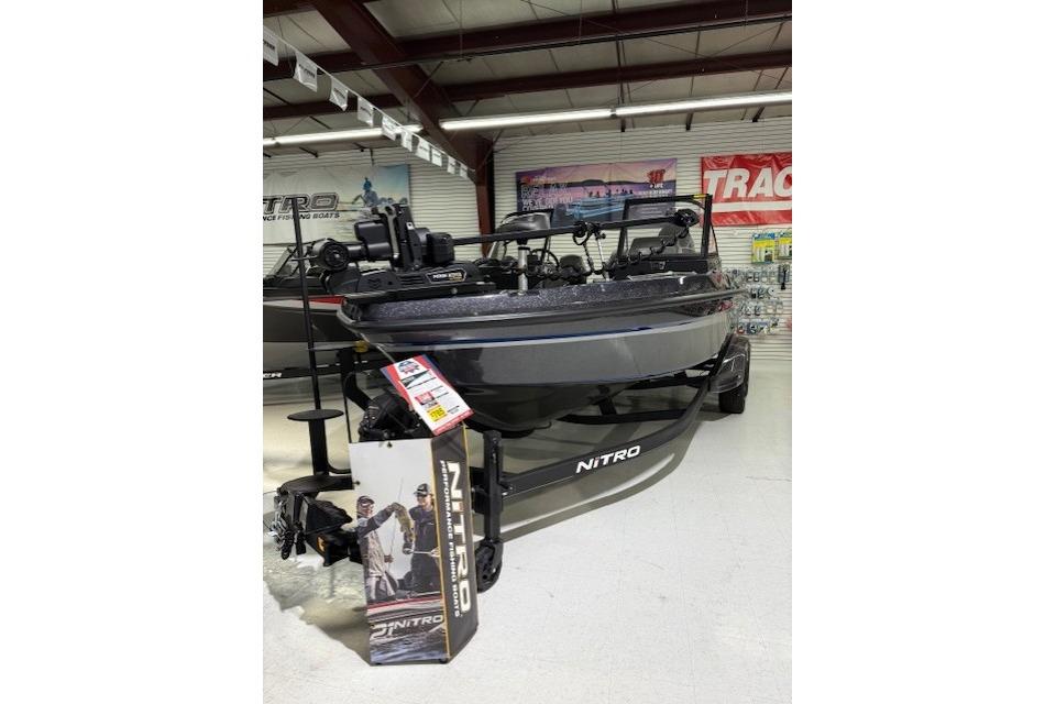 2024 Nitro ZV21 boat displayed in showroom, featuring sleek design and advanced equipment.
