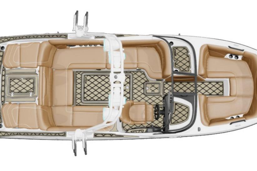 Top view of 2027 MB B52 23 Alpha boat with tan seating and patterned flooring.