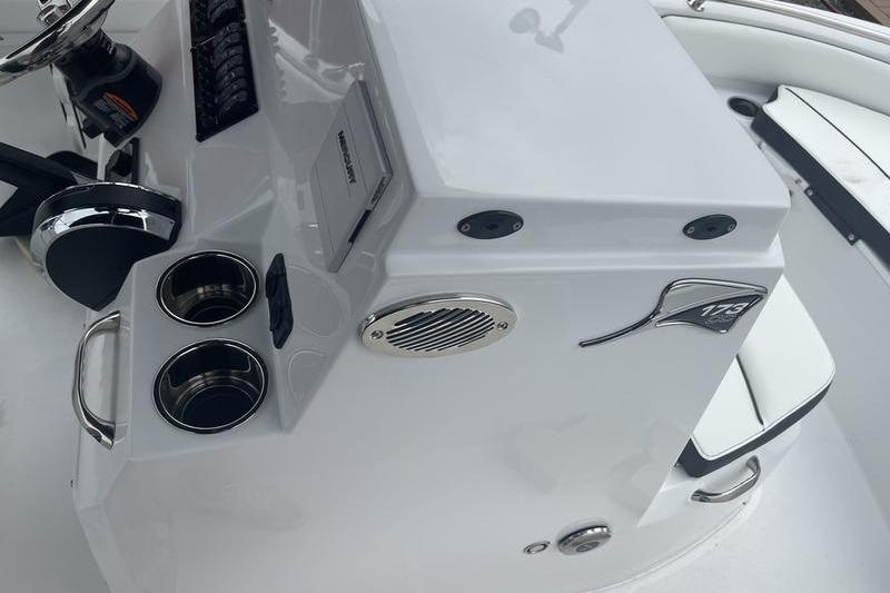 2025 Stingray 173CC boat console with cup holders and steering wheel.