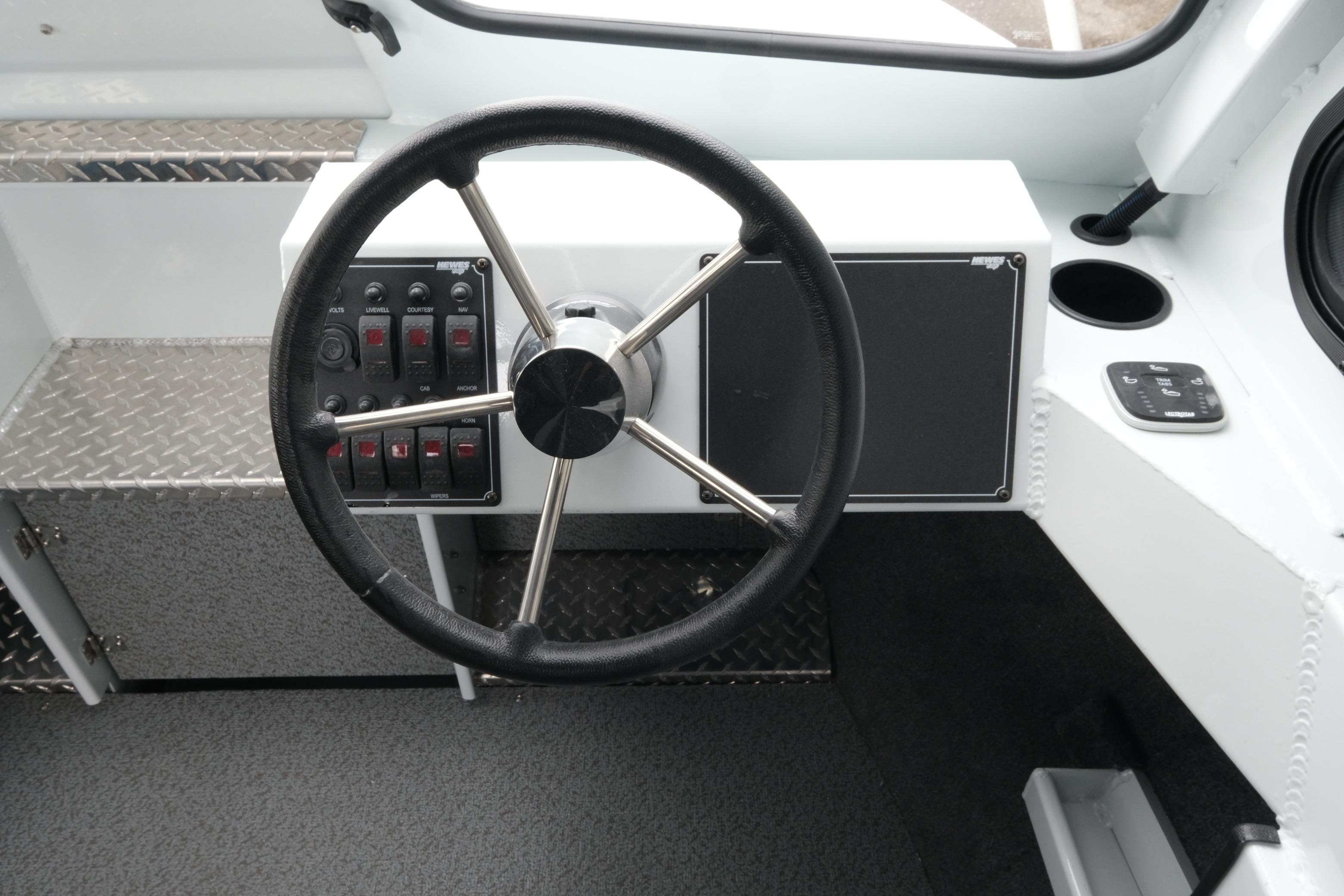 Steering wheel and control panel of 2026 Hewescraft 210 Sea Runner ET Hardtop boat.