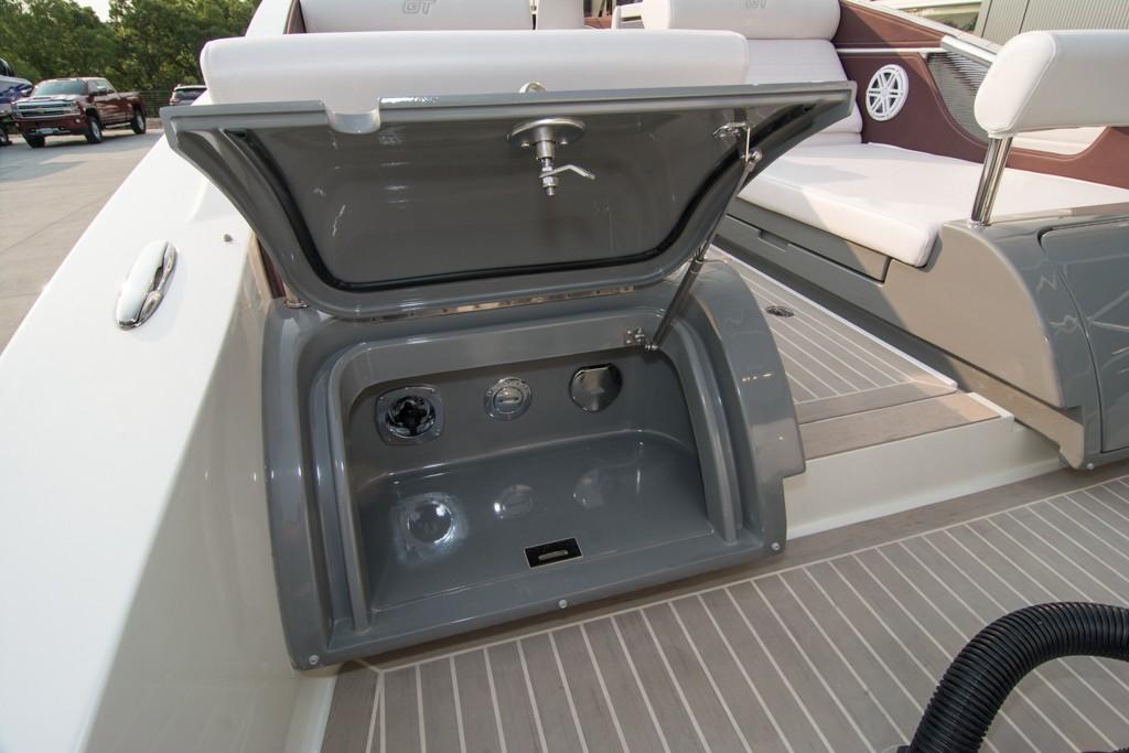 2019 Donzi 41 GT boat with open storage compartment on deck.