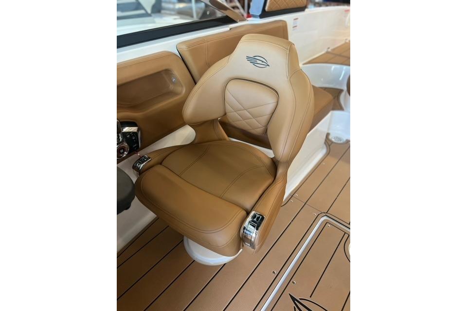 Luxurious tan seat in 2025 Chaparral 247 SSX boat interior.