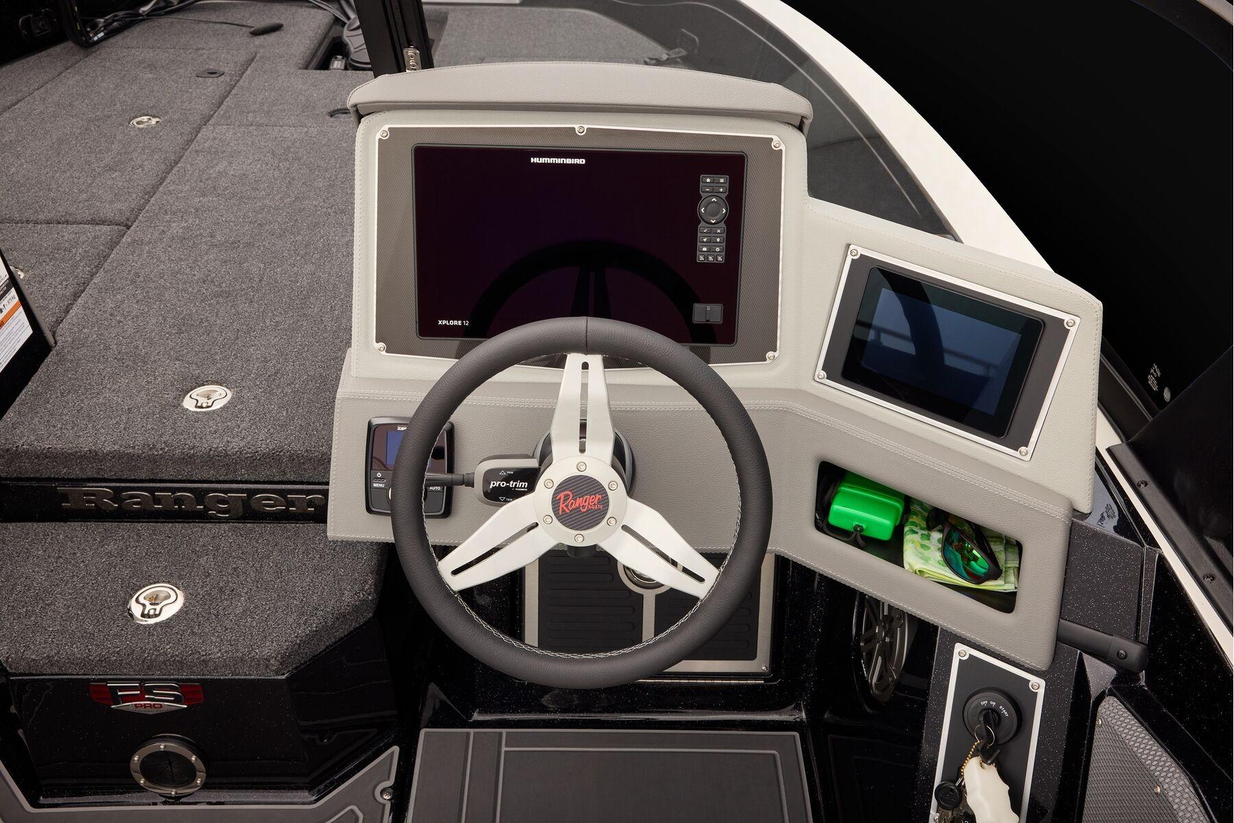 Manufacturer Provided Image: 2026 Ranger 620xFS Pro boat dashboard with steering wheel and electronic displays.