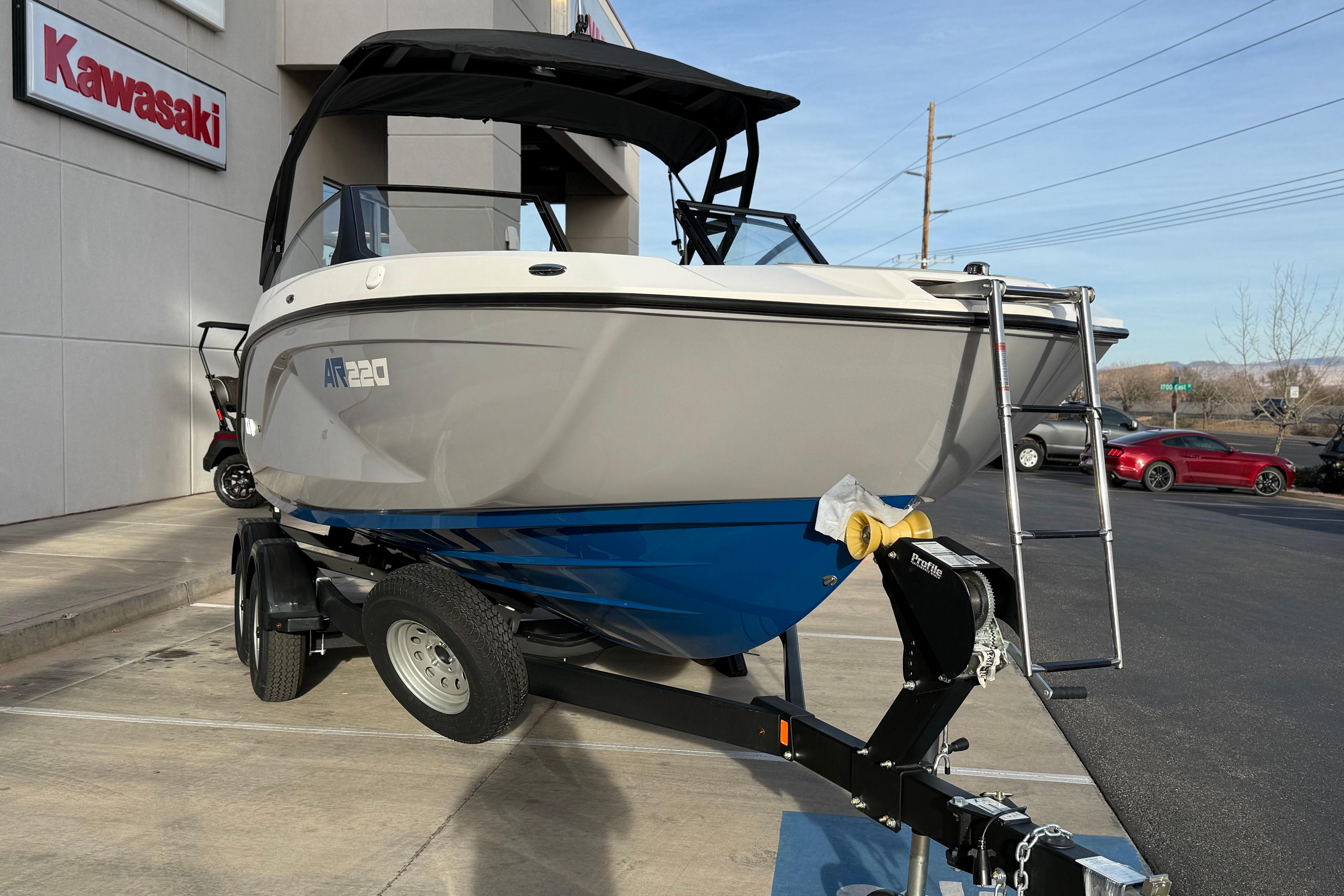 2026 Yamaha Boats AR220 on trailer outside dealership.