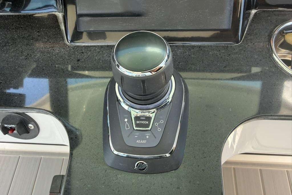 Joystick control on 2026 Monterey Elite 30 OB boat dashboard.
