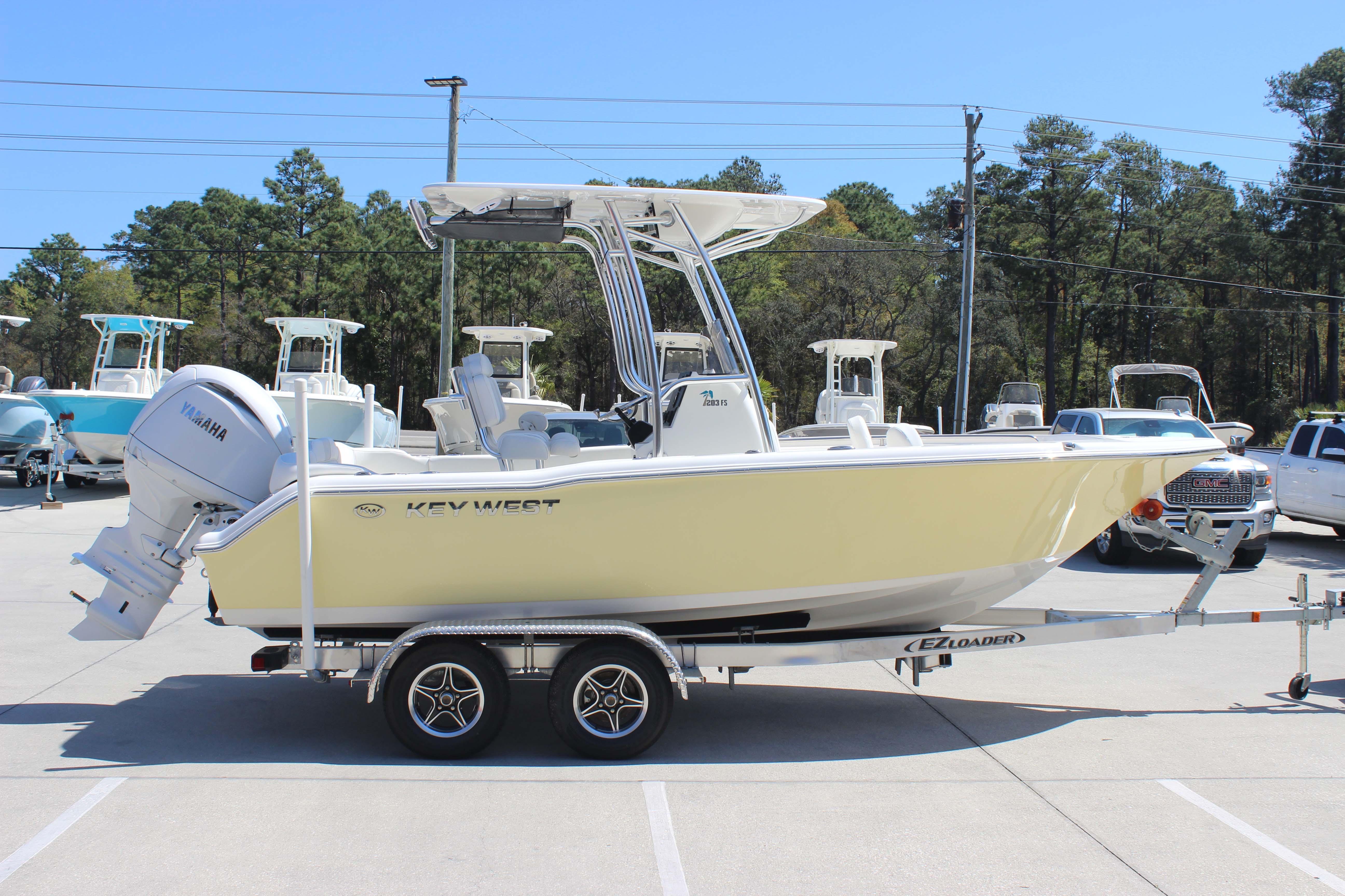 2026 Key West 203 FS boat on trailer, parked outdoors, side view.