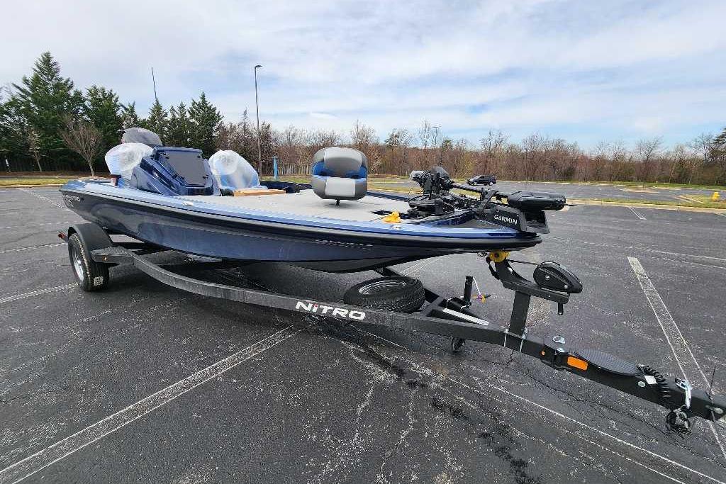 2026 Nitro Z18 Pro boat on trailer in parking lot.