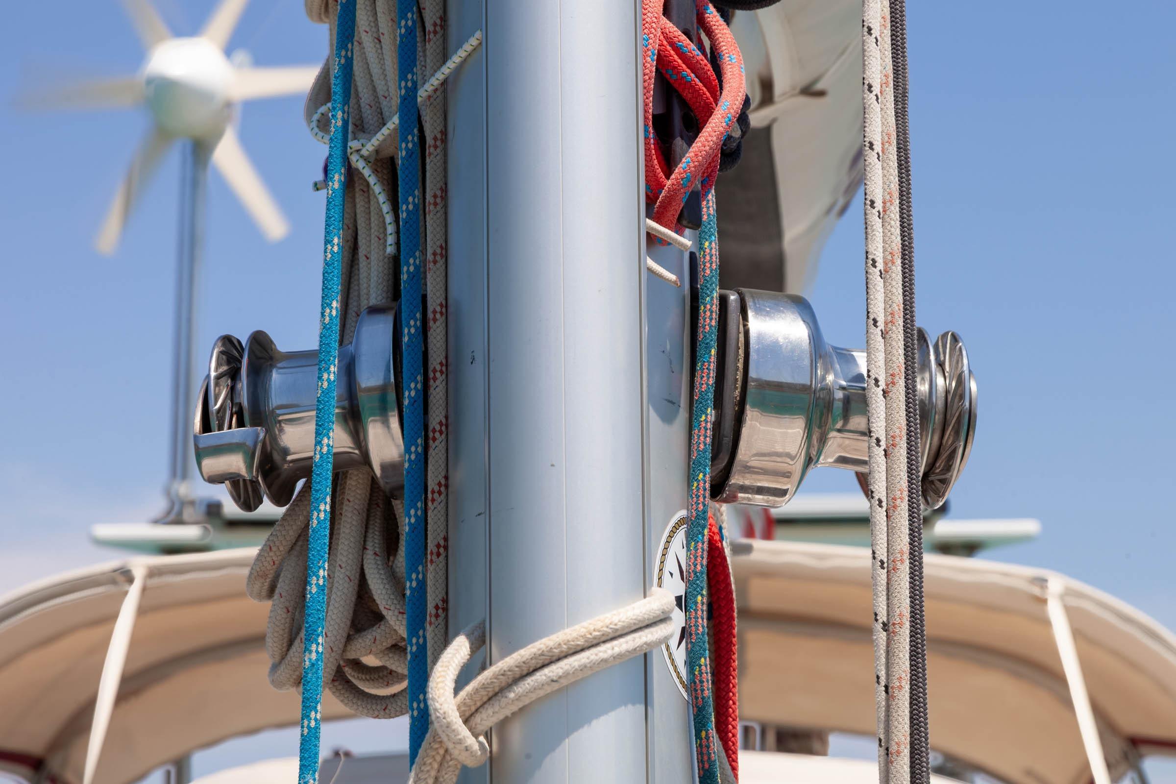 Close-up of Najad 361 sailboat mast with colorful ropes and winches, 1996 model.