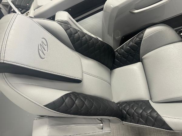 2025 Manitou LX boat seat with black and gray quilted upholstery.