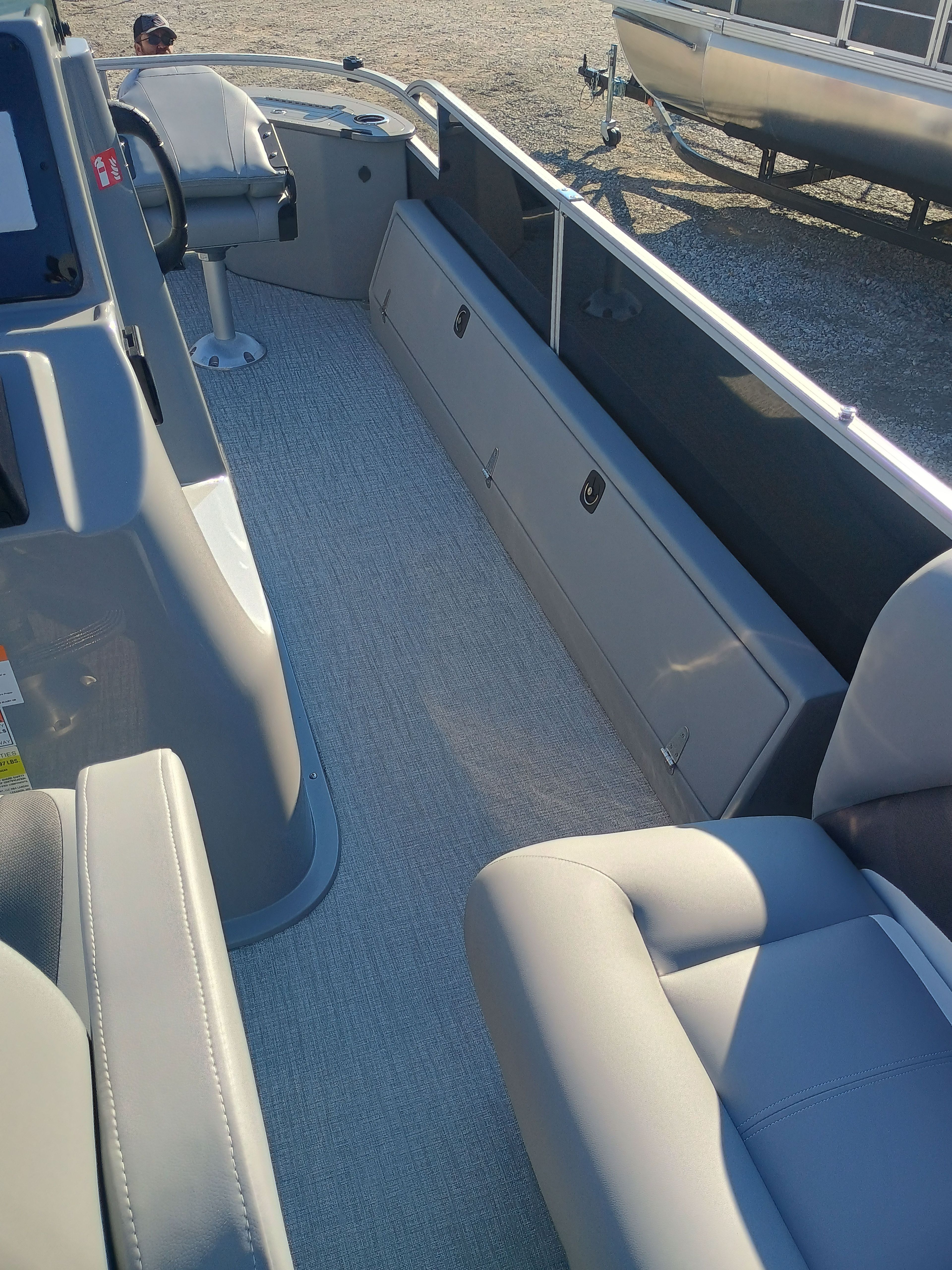 Interior of the 2026 Landau Alure 25CC Fish-Black boat.
