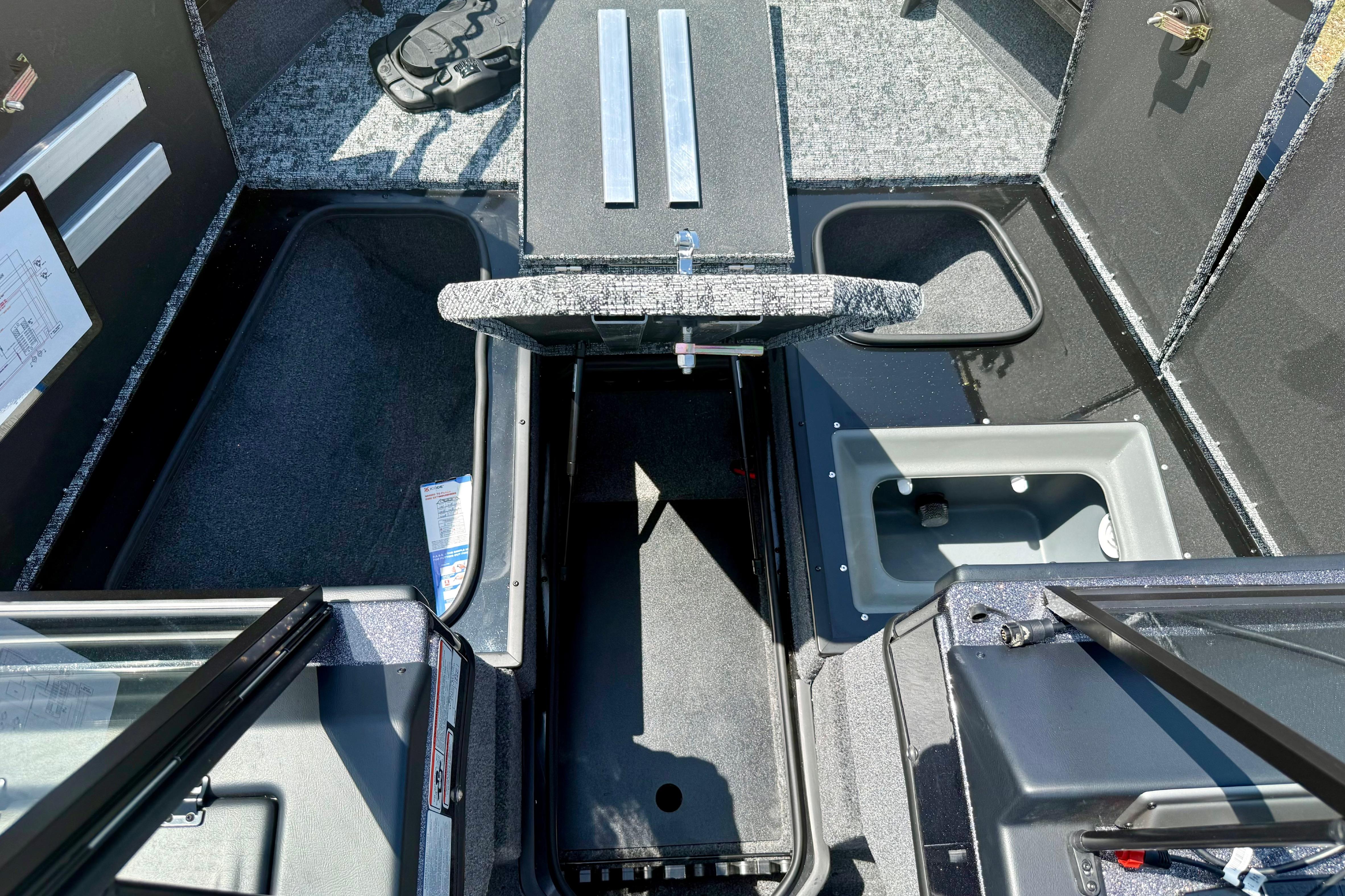 2026 Ranger VX1788 WT boat interior with storage compartments and seating.