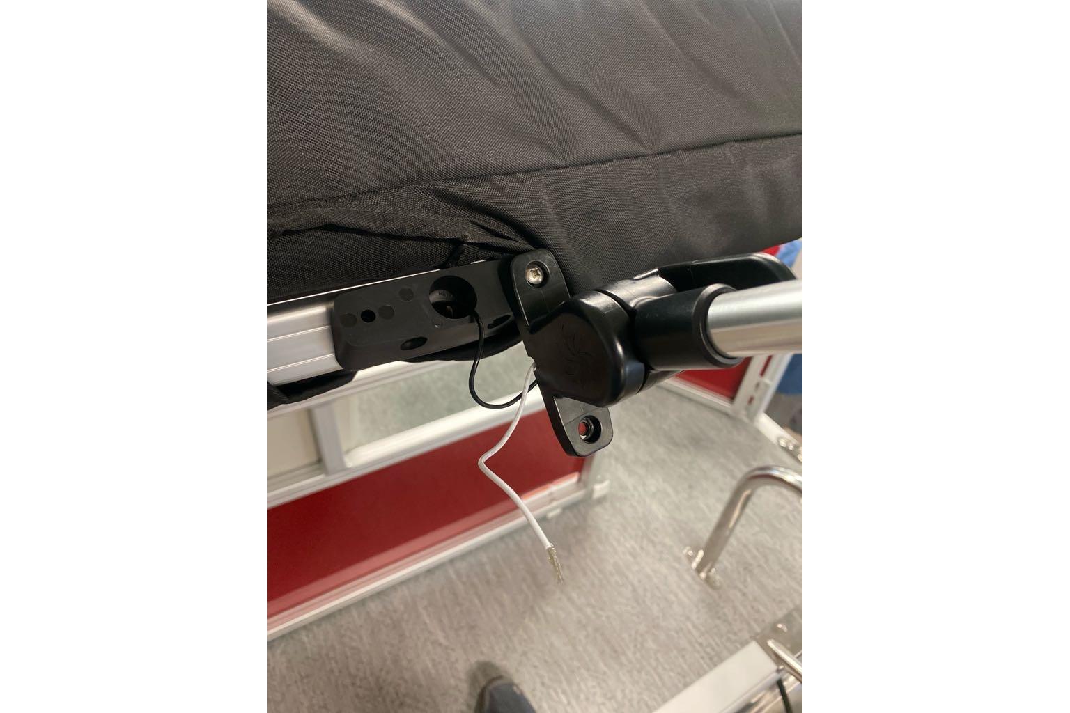Close-up of Sun Tracker Bass Buggy 16 XL Select 2026 boat canopy attachment.