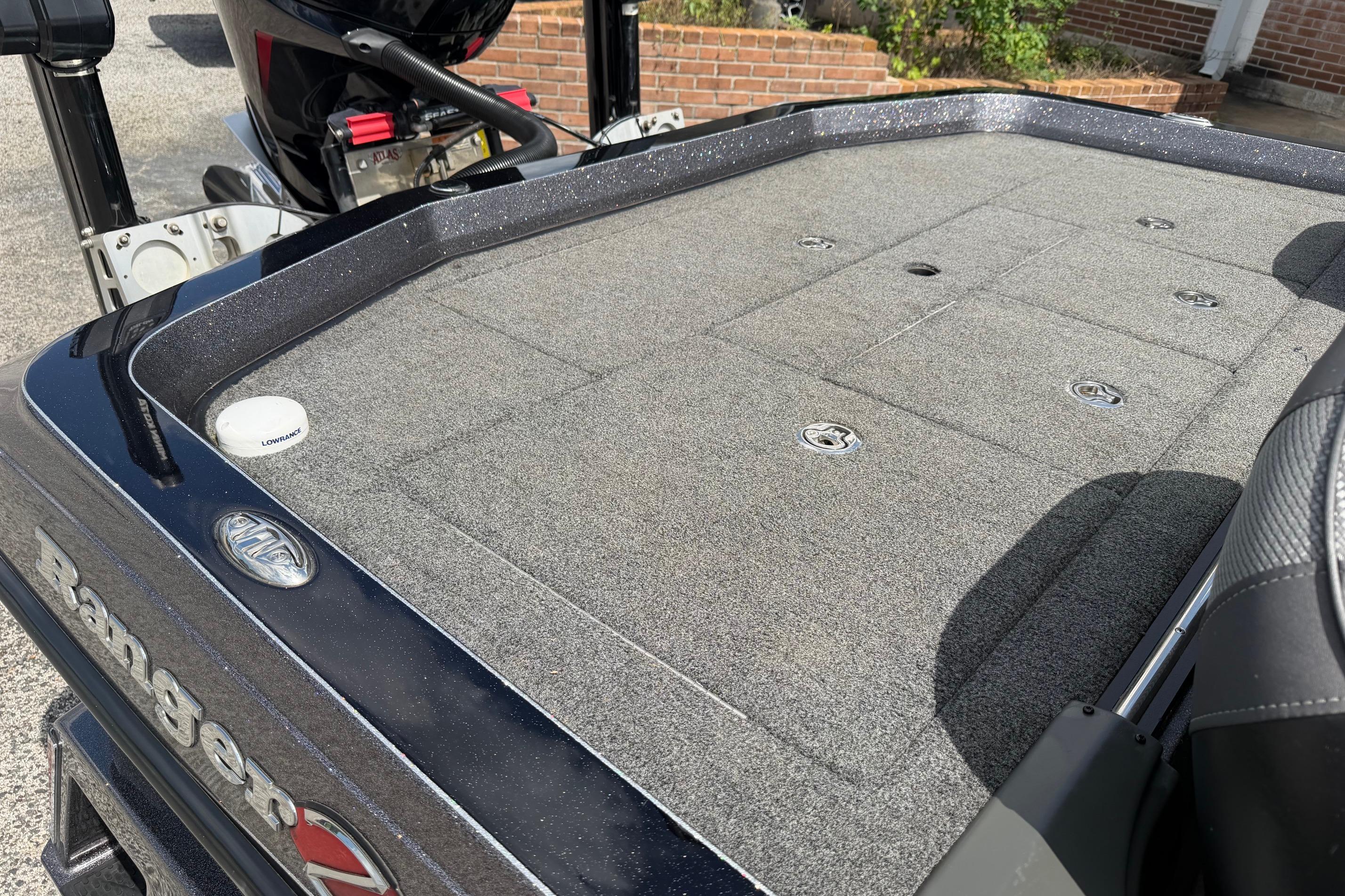 2020 Ranger Z520L boat deck with carpeted surface and storage compartments.