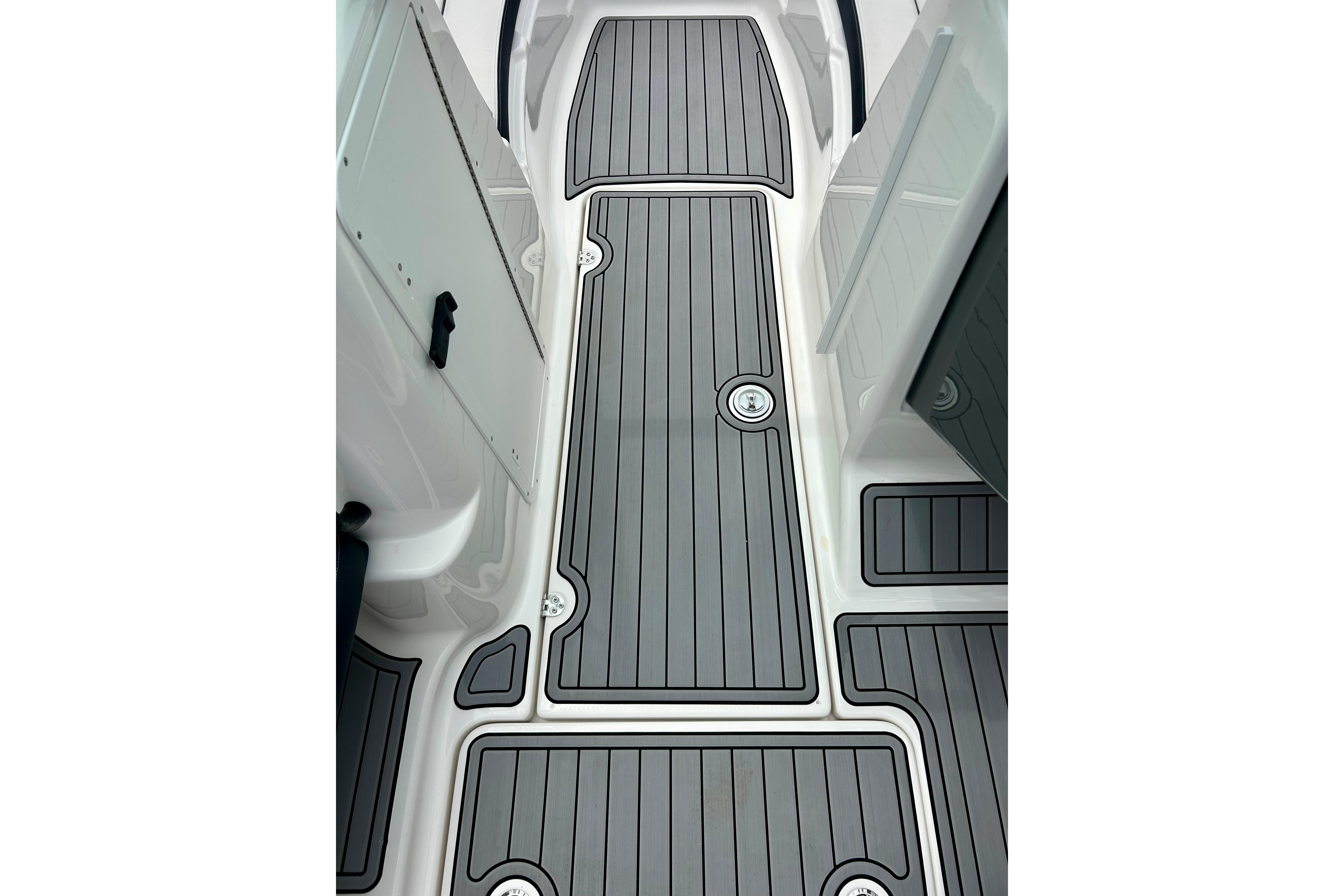 2015 Yamaha AR210 boat deck with sleek, modern gray flooring design.
