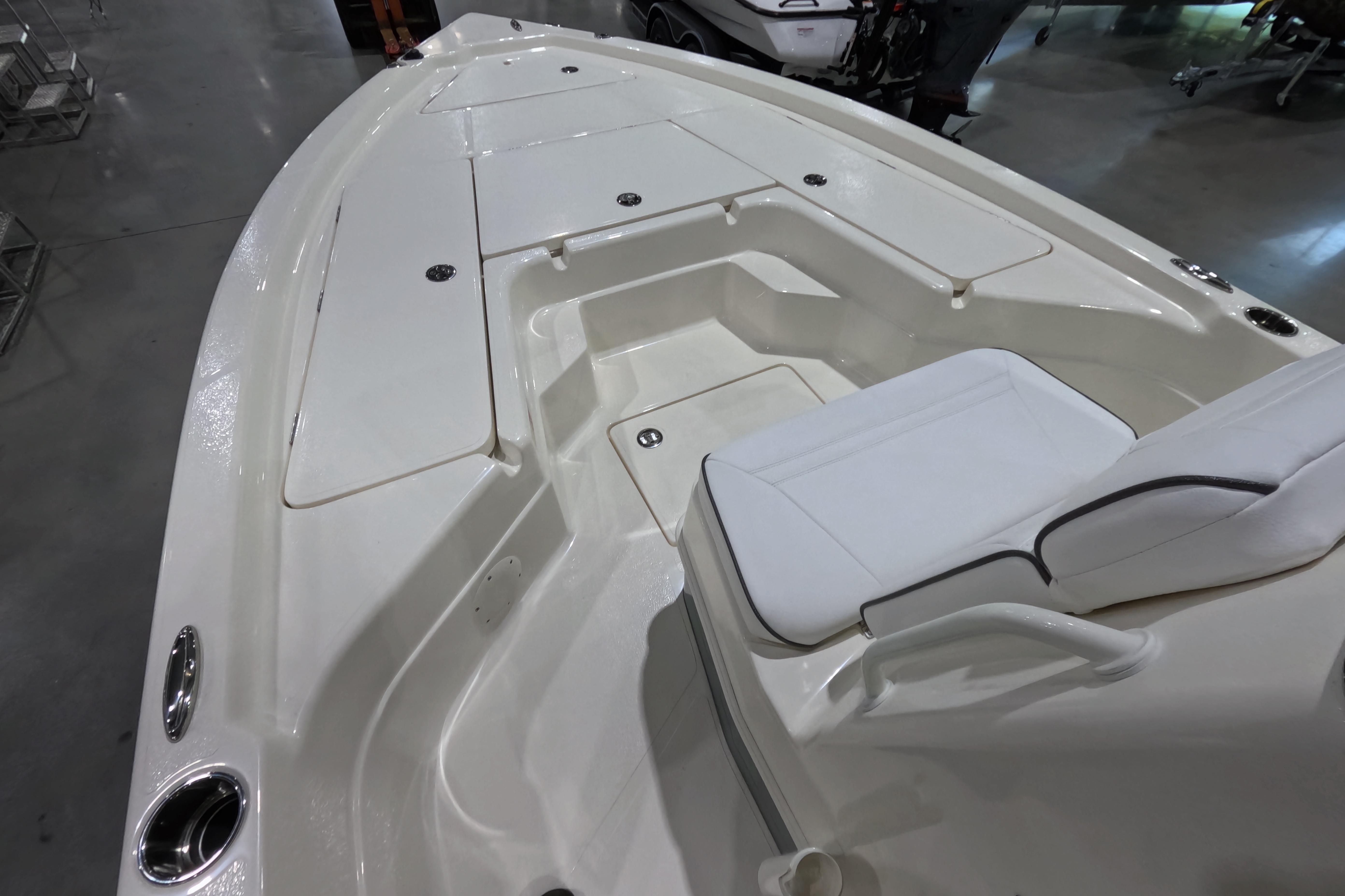 2026 Skeeter boat interior with white seating and storage compartments.