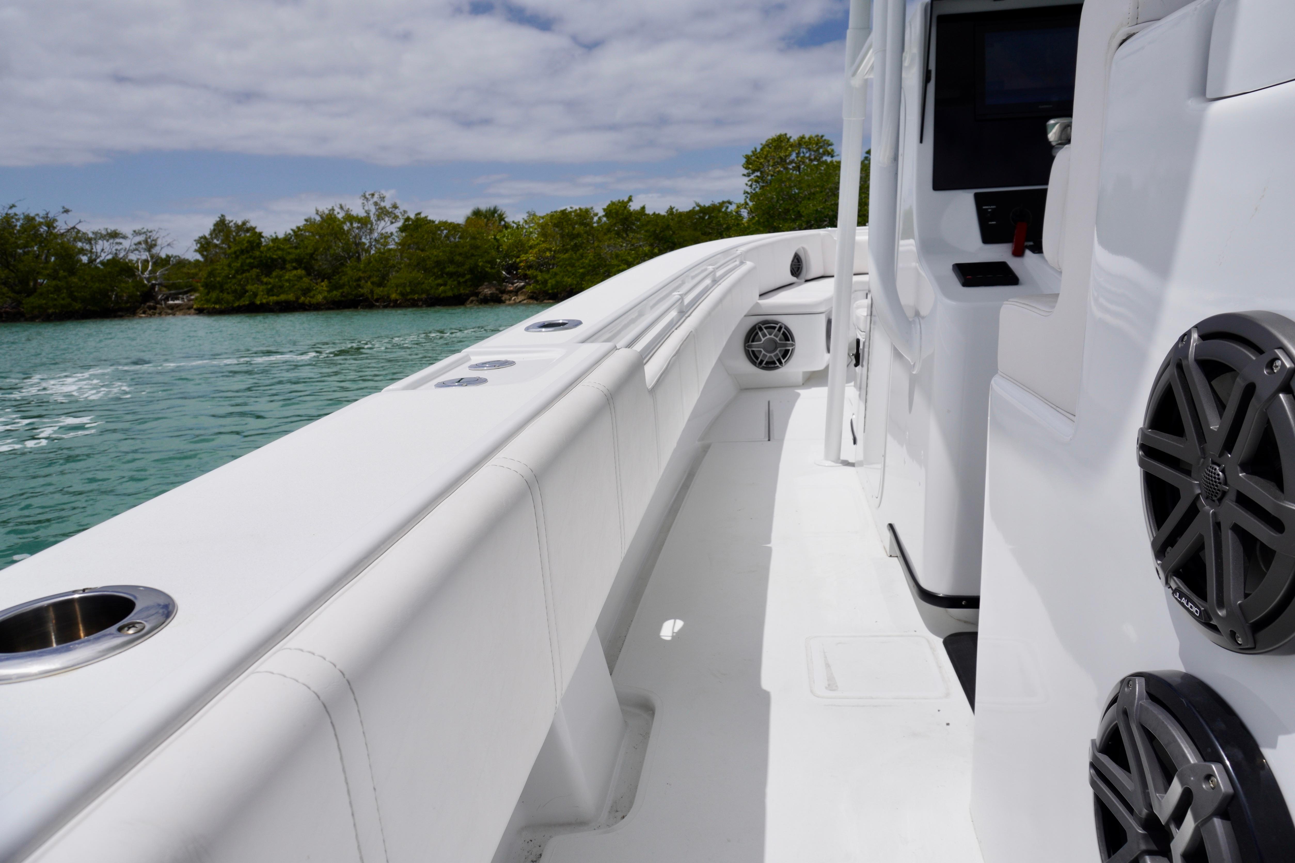 2013 Contender 35 LS boat interior with sleek white design and modern speakers.