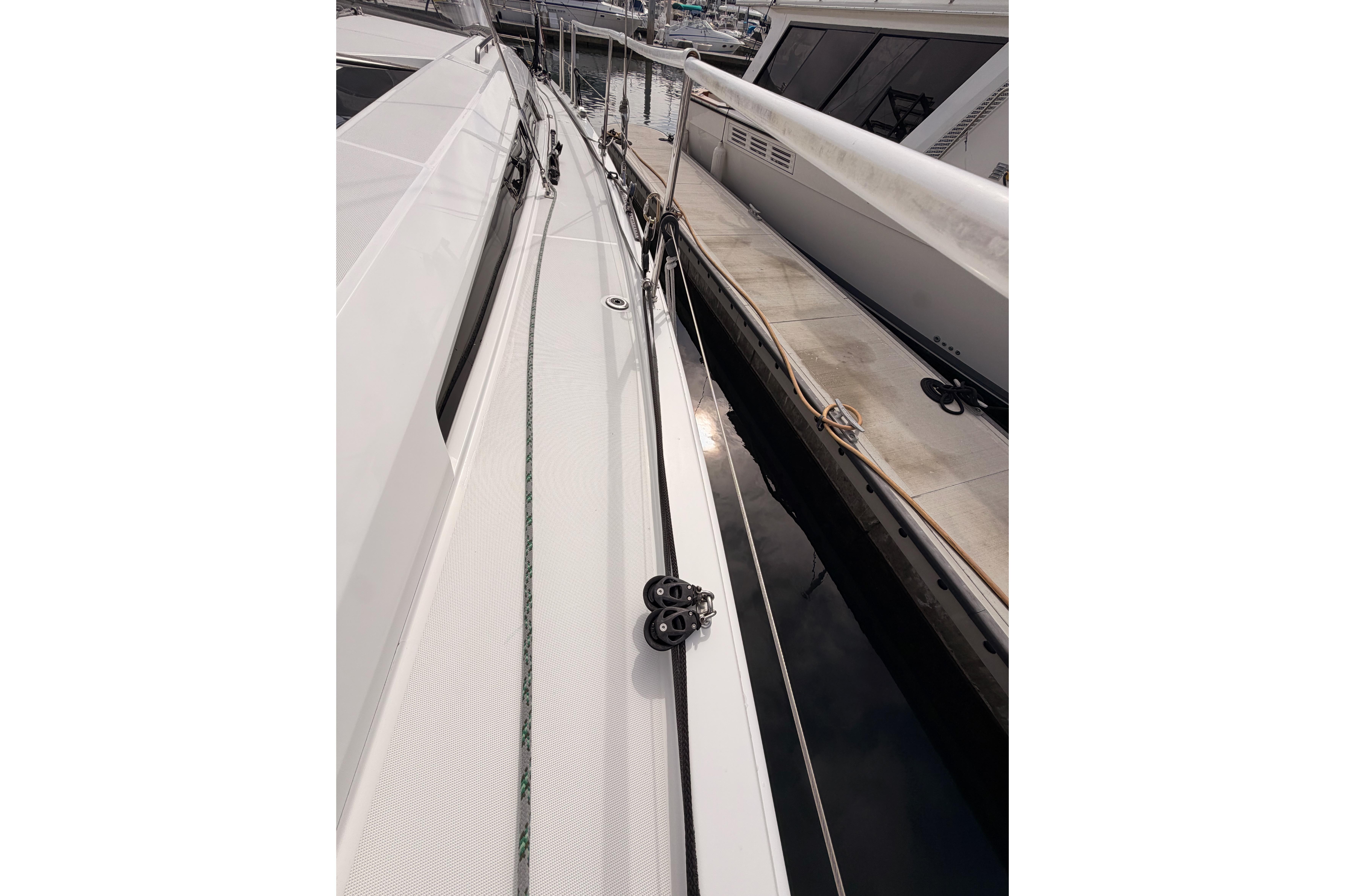 Beneteau Oceanis 46.1 sailboat deck, 2020 model, docked at marina.