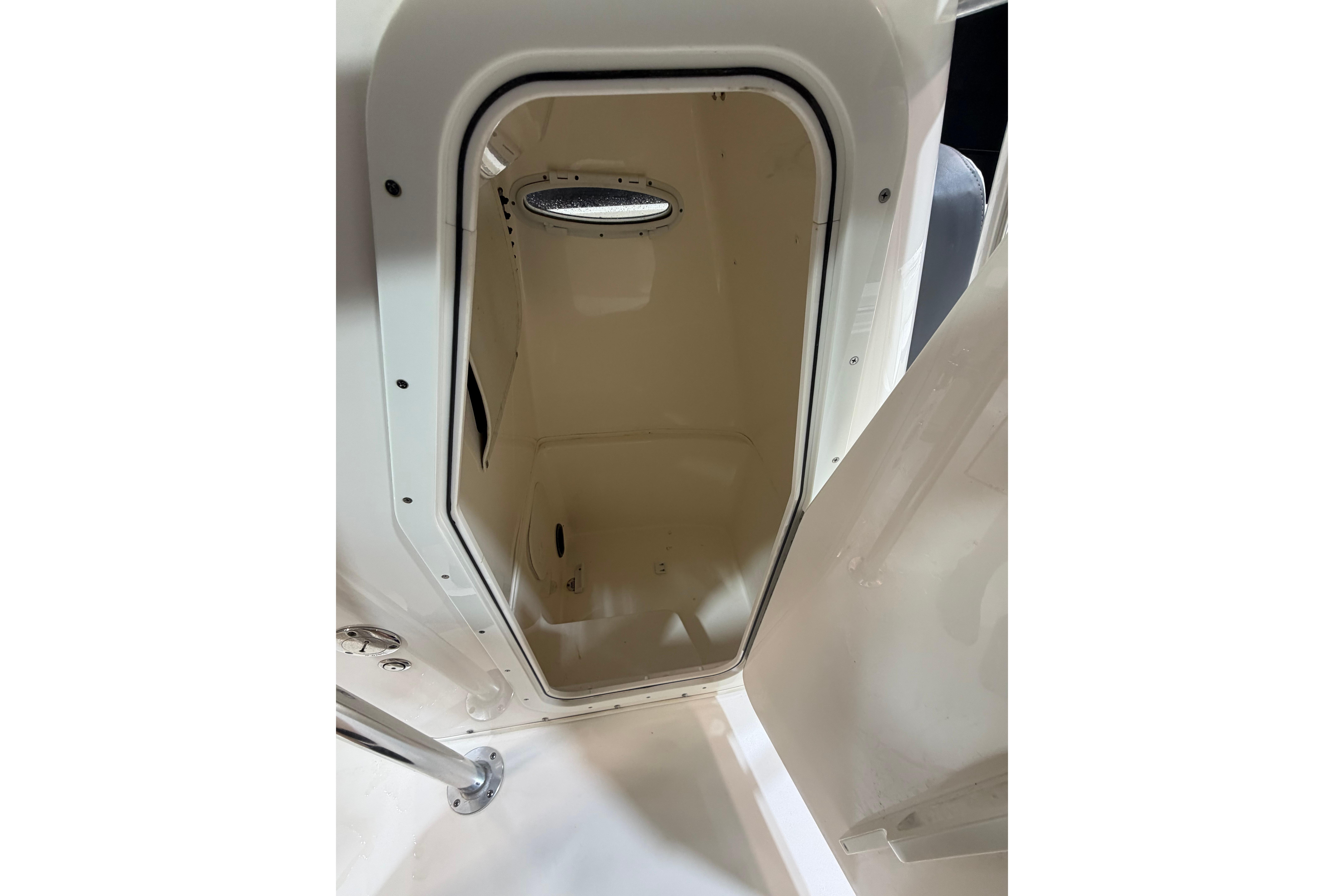 Interior view of 2023 Cobia 237 Center Console boat compartment.