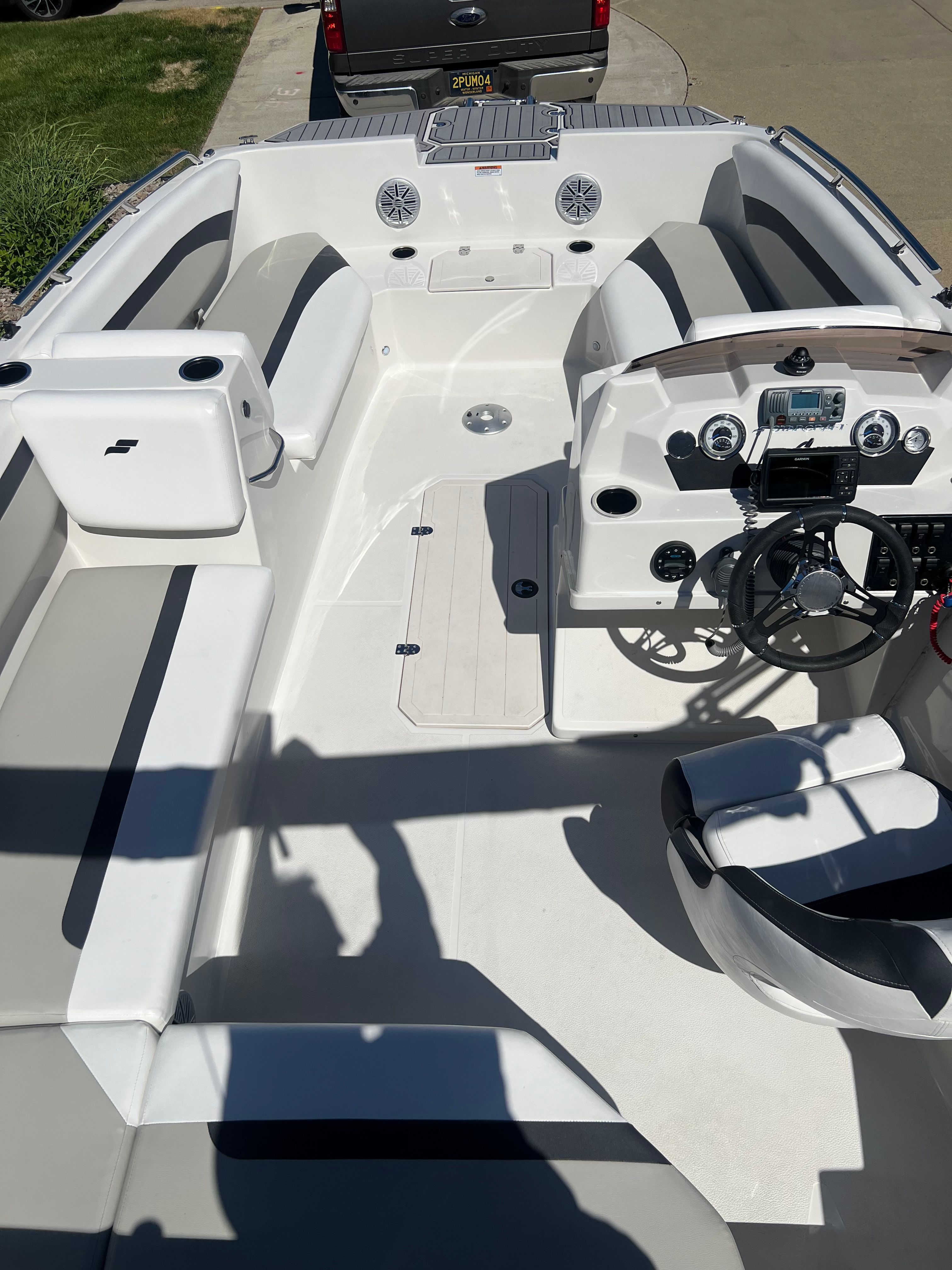Interior of a 2023 Starcraft SVX 171 OB boat with steering console.