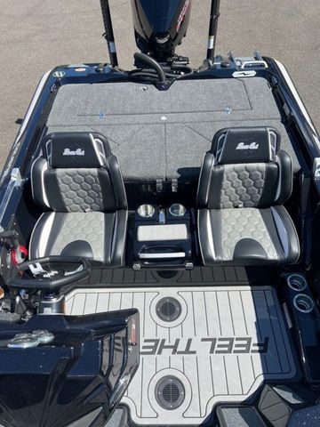 2026 Bass Cat Cougar FTD SP boat interior with dual seats and steering wheel.