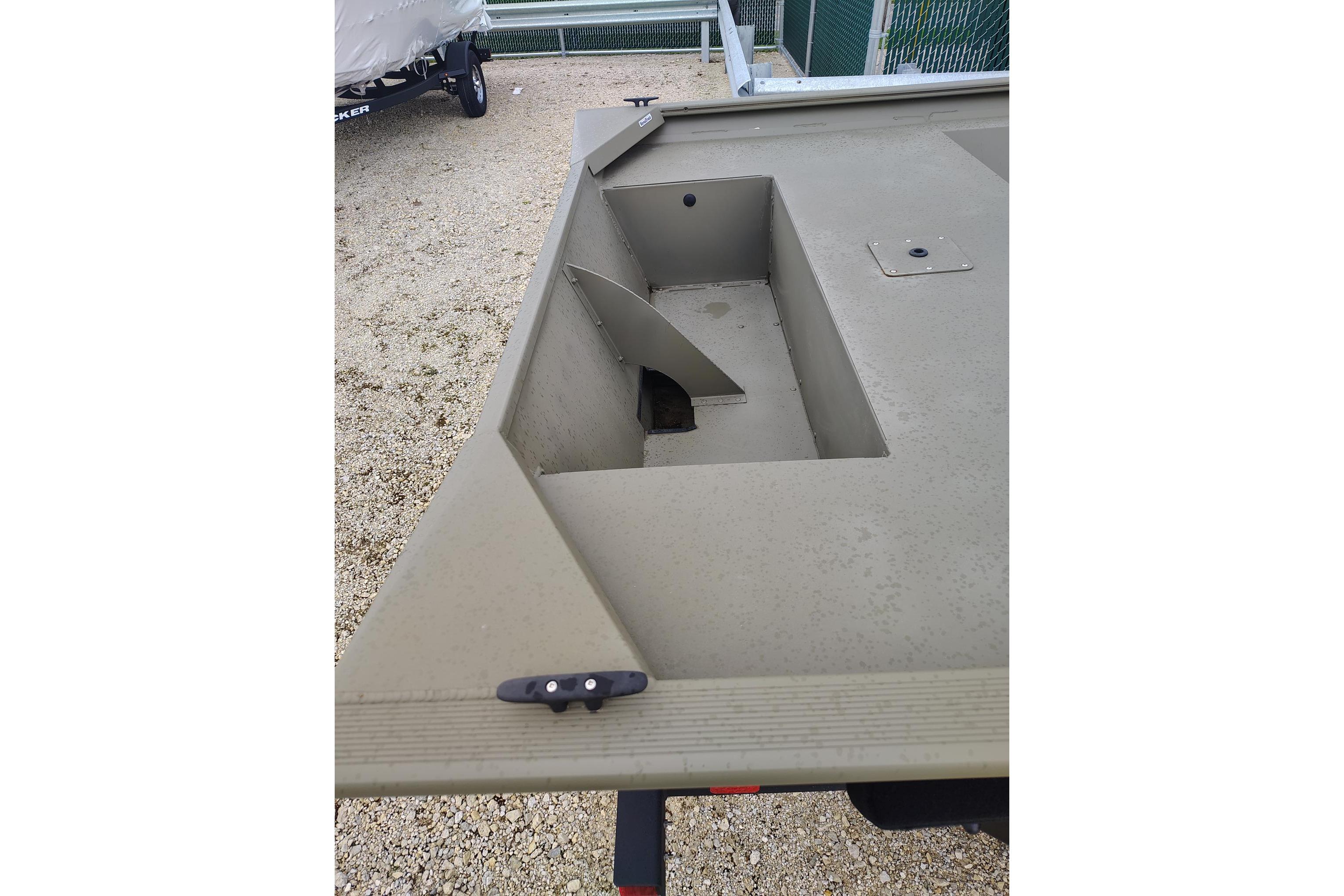 2025 Tracker Grizzly 1860 Utility boat, showing interior storage compartment detail.