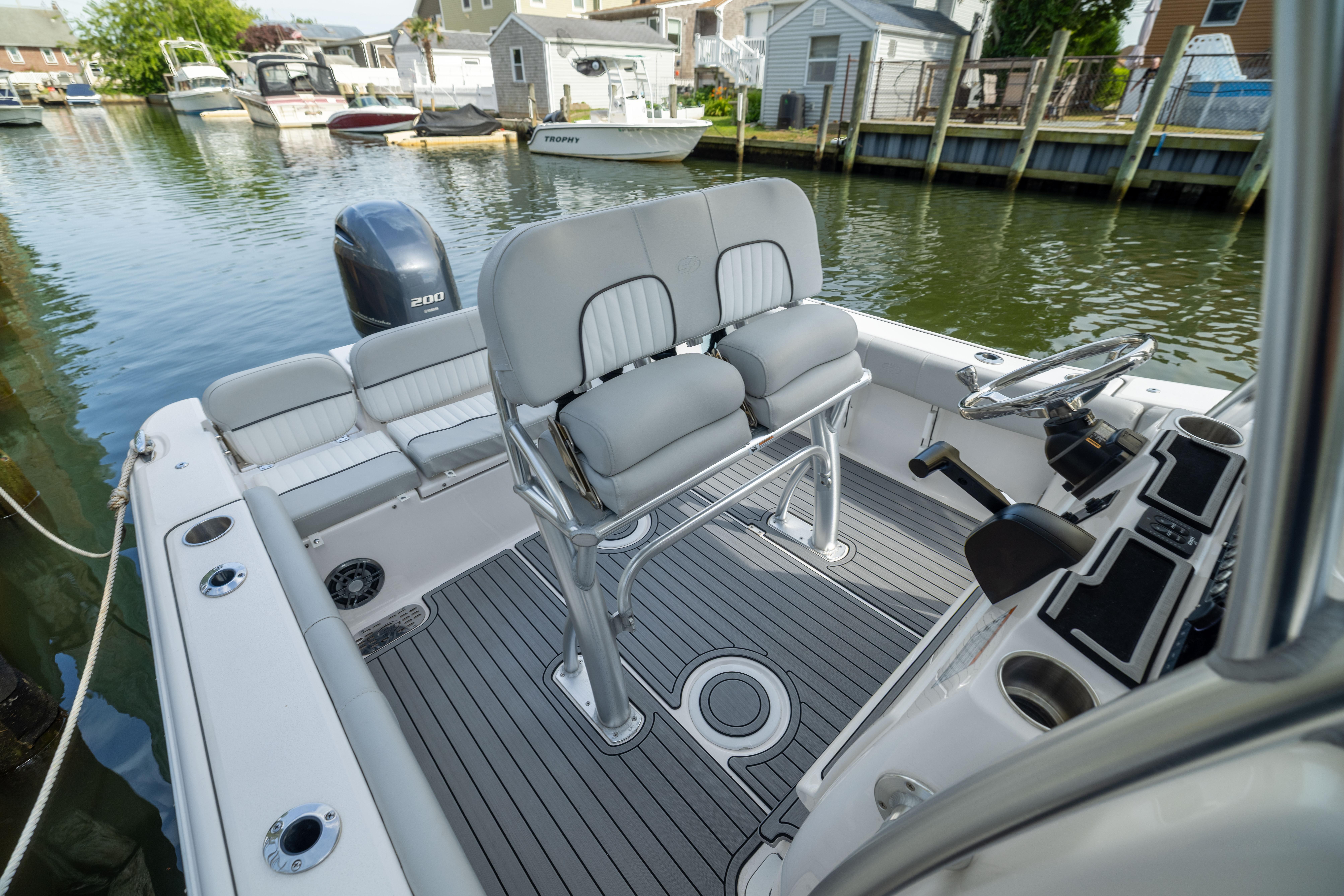 2023 Sea Fox 228 Commander boat interior with dual seating and steering console.