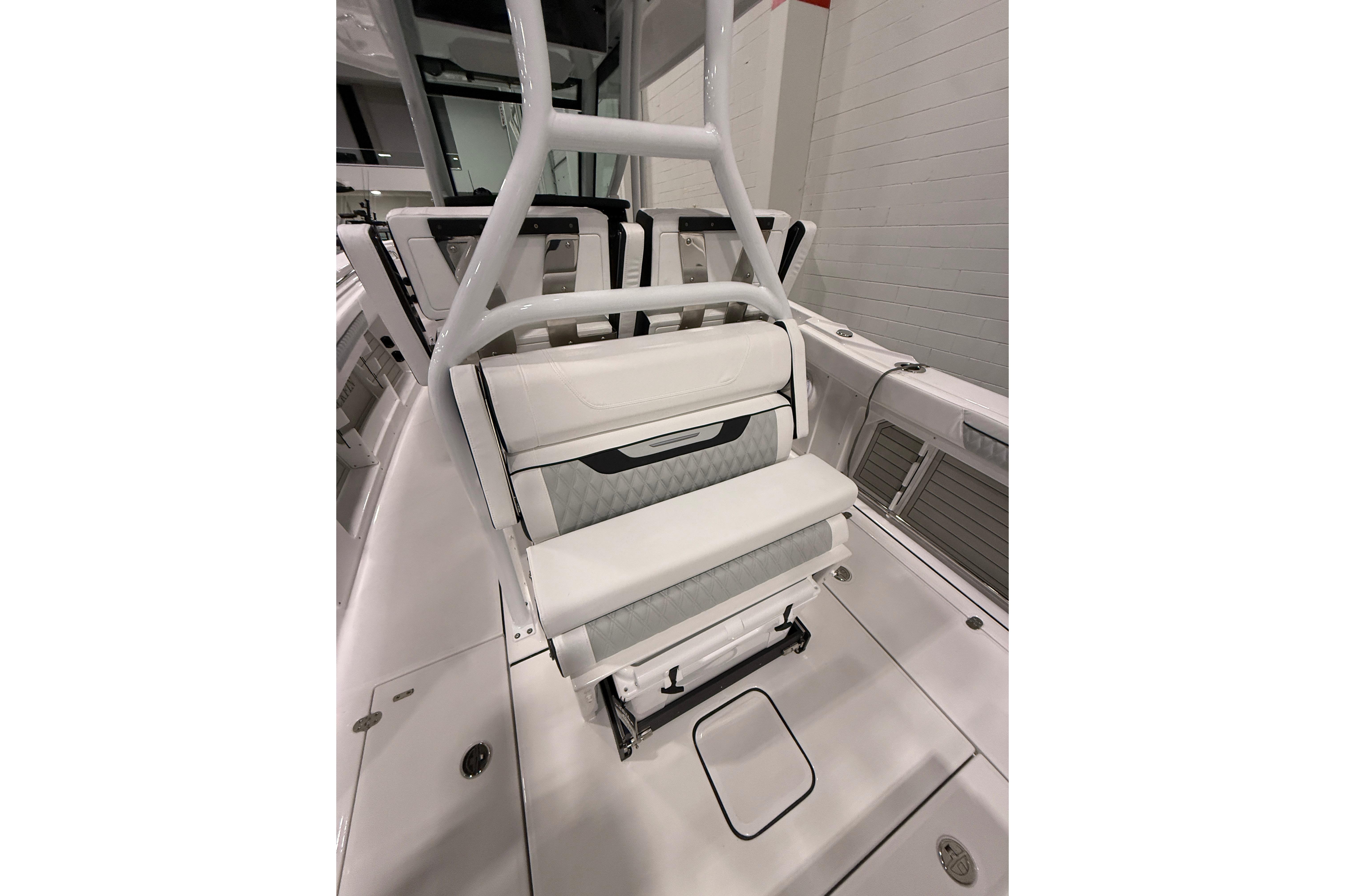 2026 Blackfin 302 CC boat interior with white seating and sleek design.