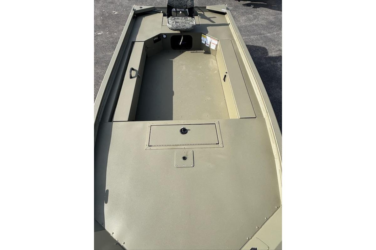 2026 Tracker Grizzly 1654 T Sportsman boat interior, featuring spacious seating and storage.