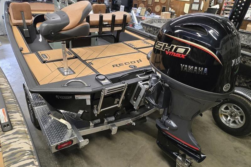 Avid 207 Recon 2026 boat with Yamaha SHO VMAX engine in showroom.
