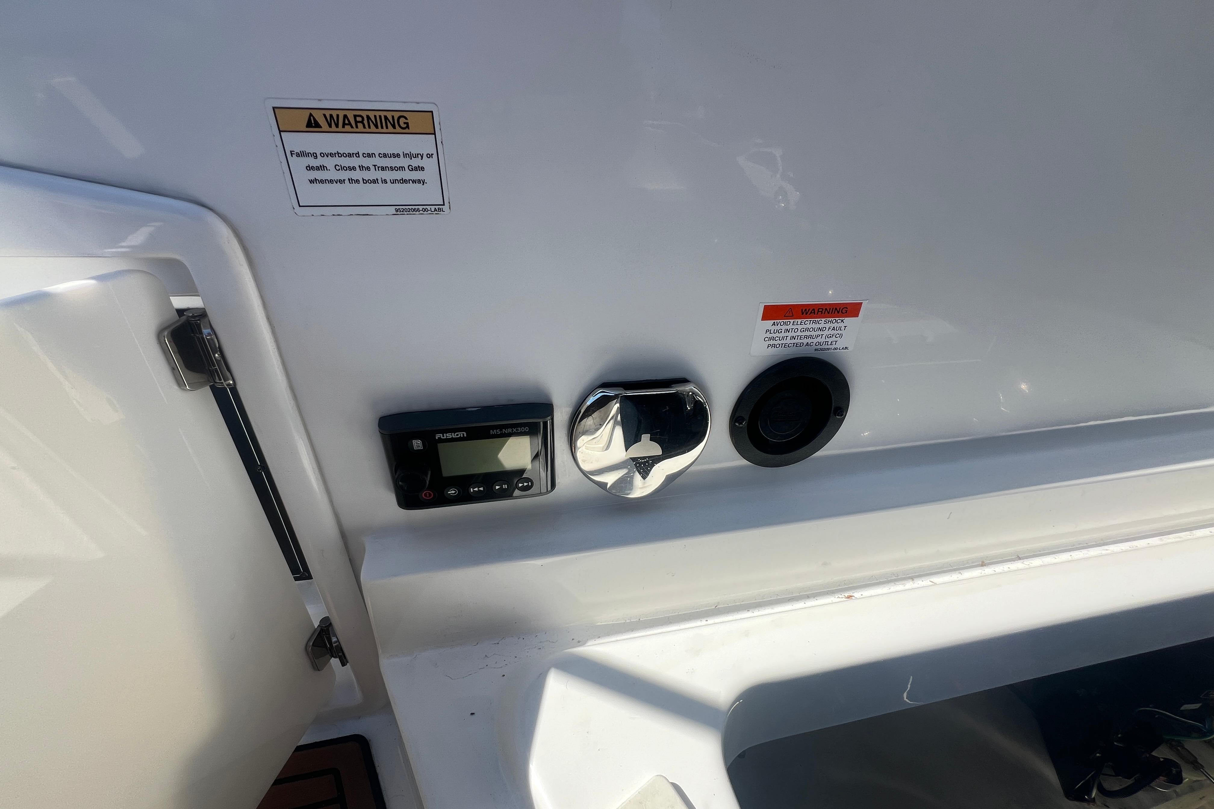 Control panel and warning labels on a 2017 Monterey 298SS Super Sport boat.