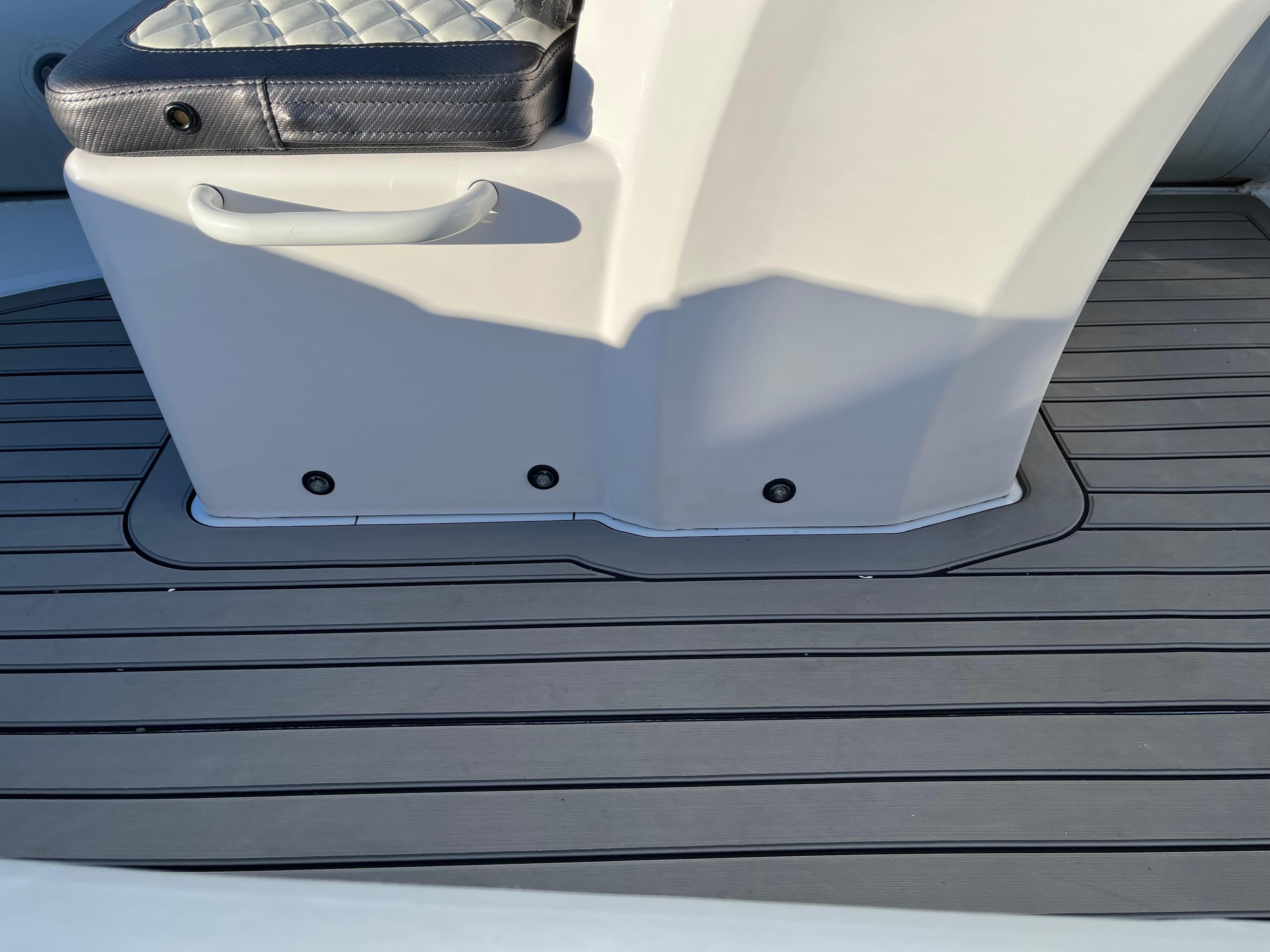 2023 Highfield Sport 420 boat interior with cushioned seat and sleek, modern flooring design.
