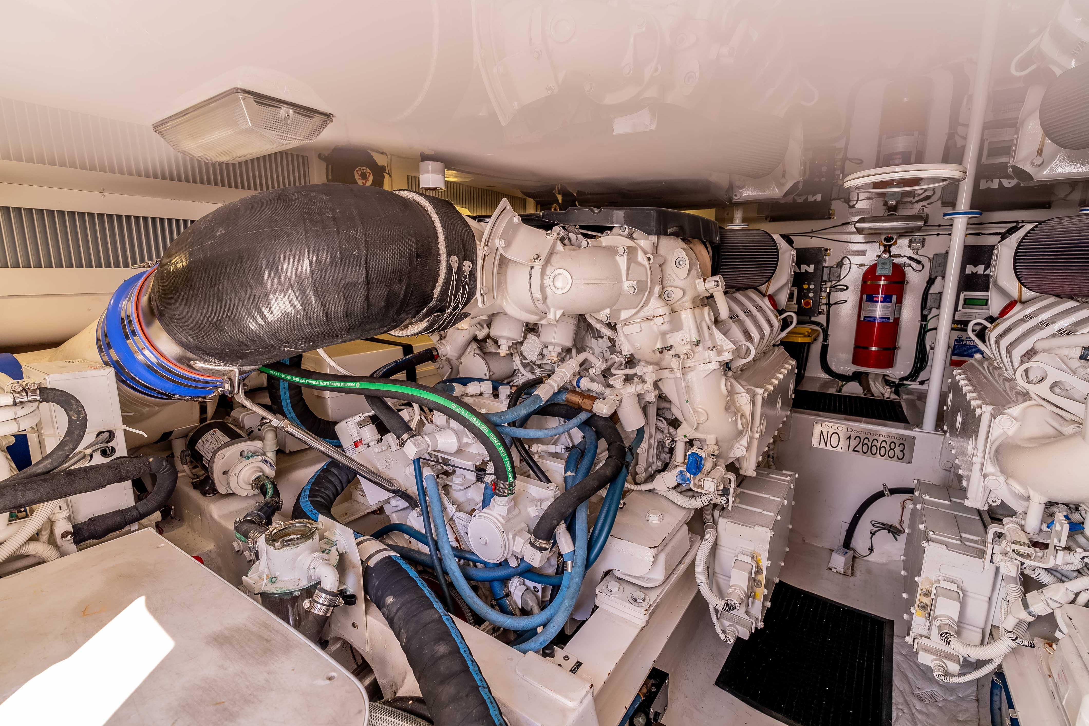 Engine room of 2014 Viking 46 Convertible yacht, featuring advanced machinery and equipment.