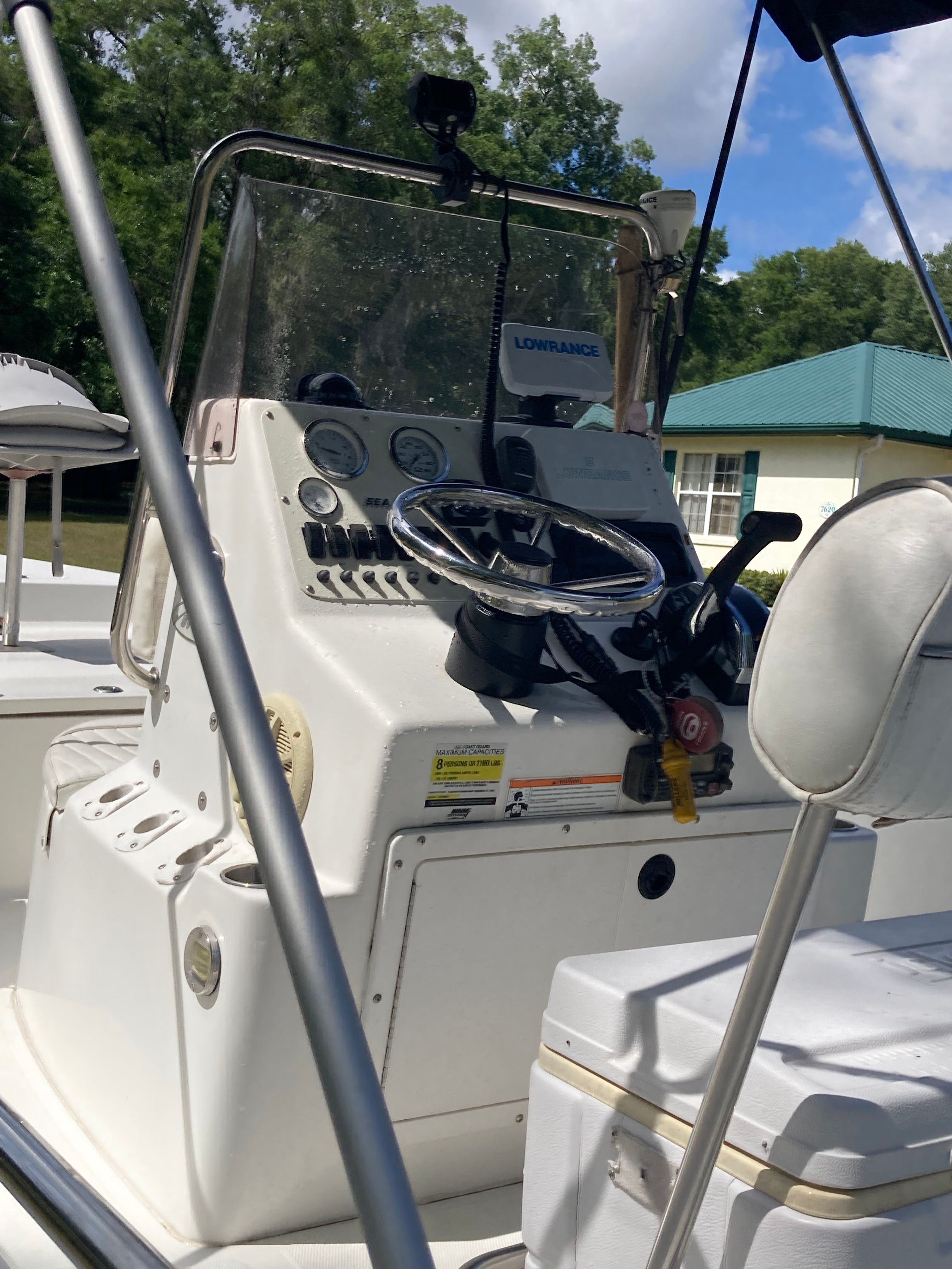 2007 Seapro SV1900CC boat console with steering and instruments.