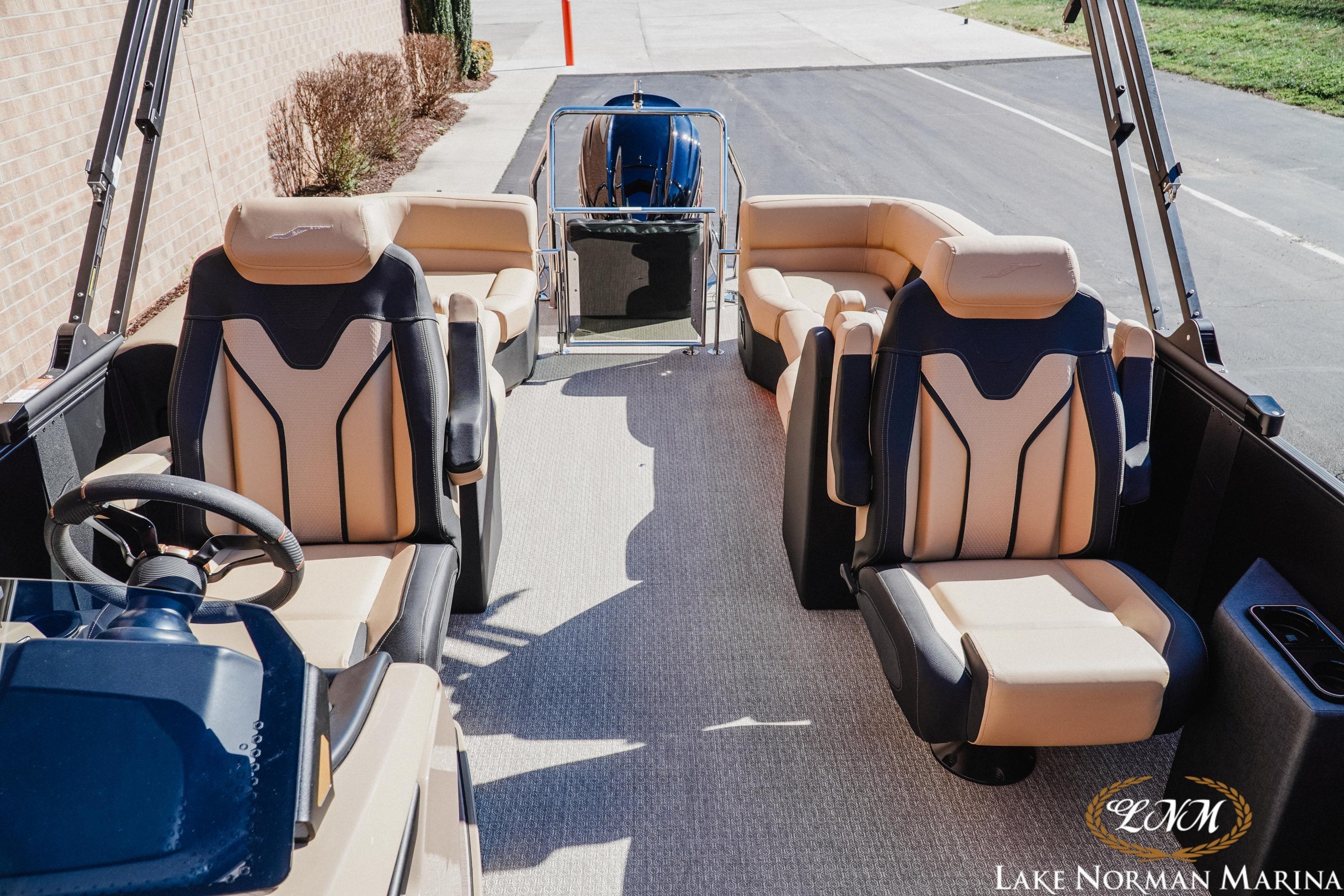 Luxury interior of 2026 Evotti 723QL boat at Lake Norman Marina.