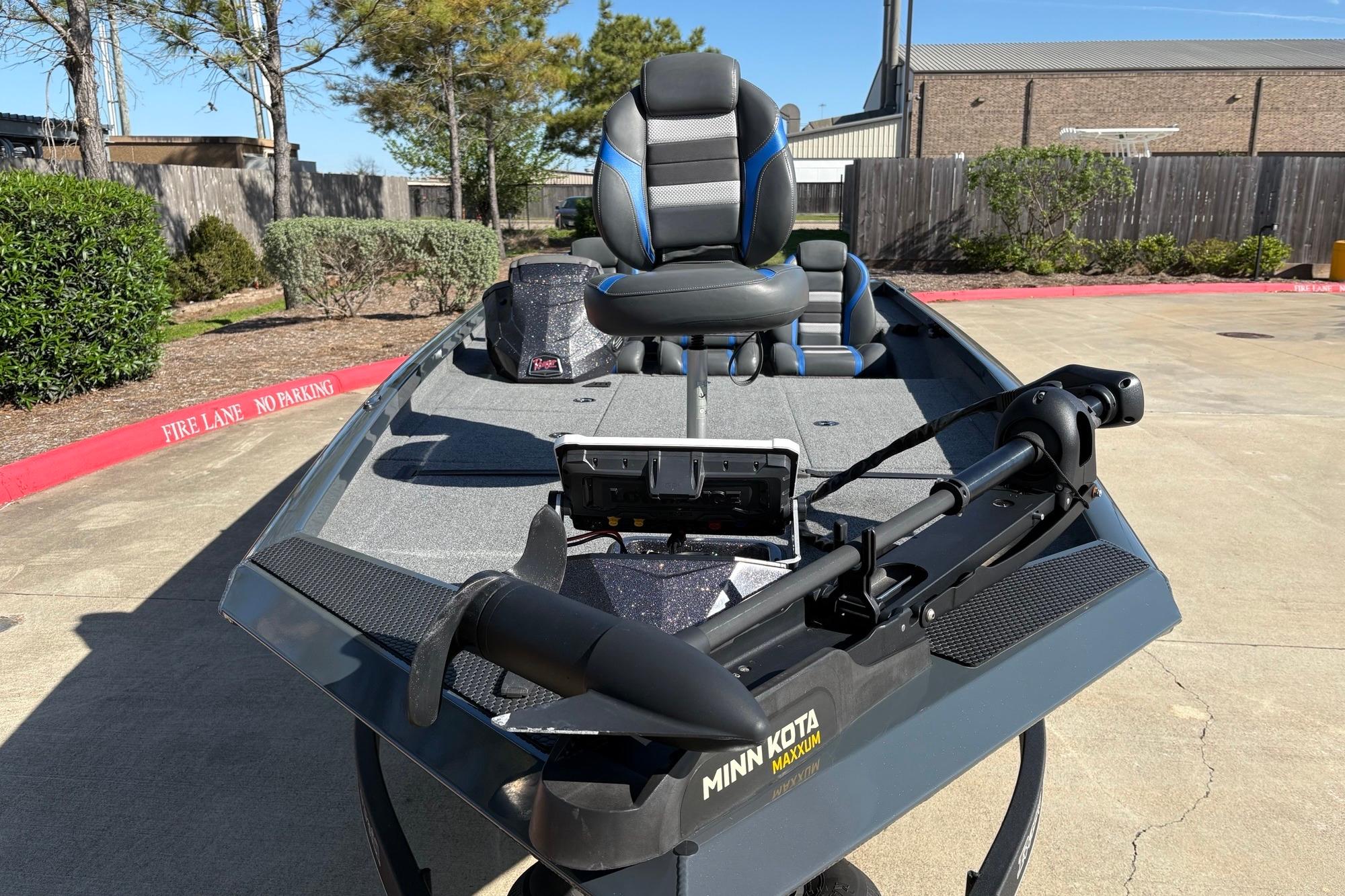 2024 Ranger RT198P boat with Minn Kota Maxxum trolling motor in a parking area.