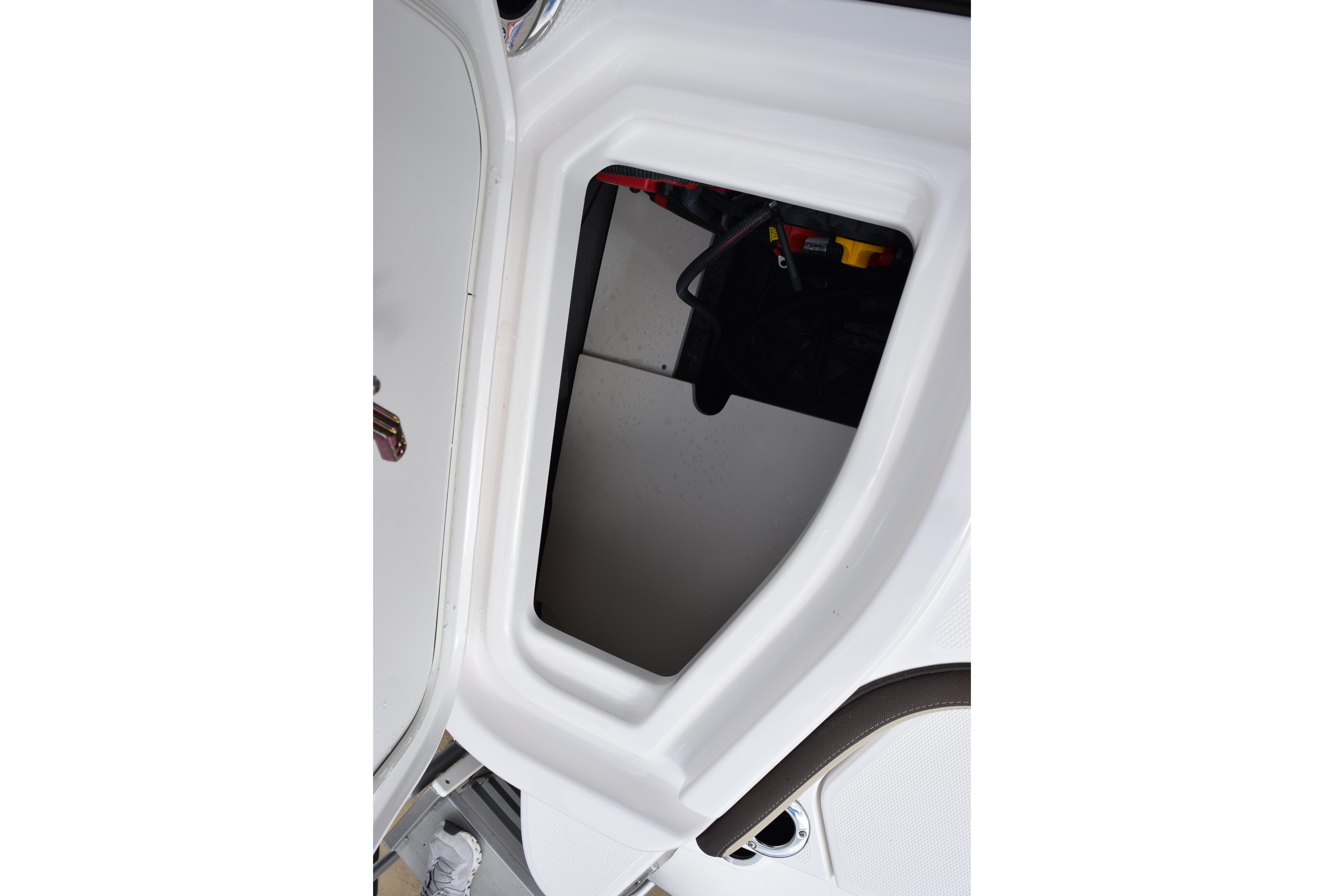 2026 Yamaha Boats 255 FSH Sport H storage compartment detail.