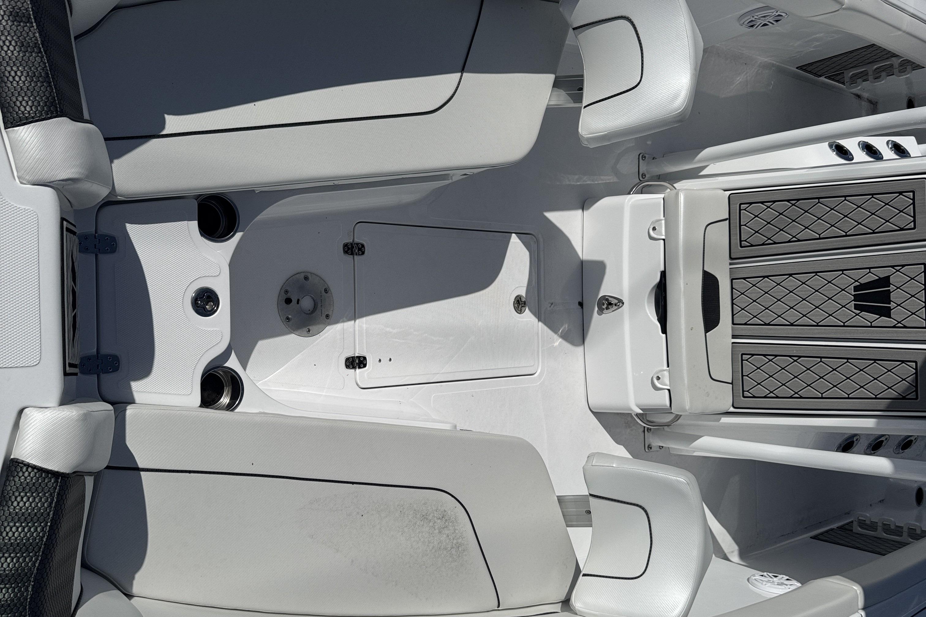 2025 Wellcraft 242 Fisherman boat interior with sleek seating and storage compartments.