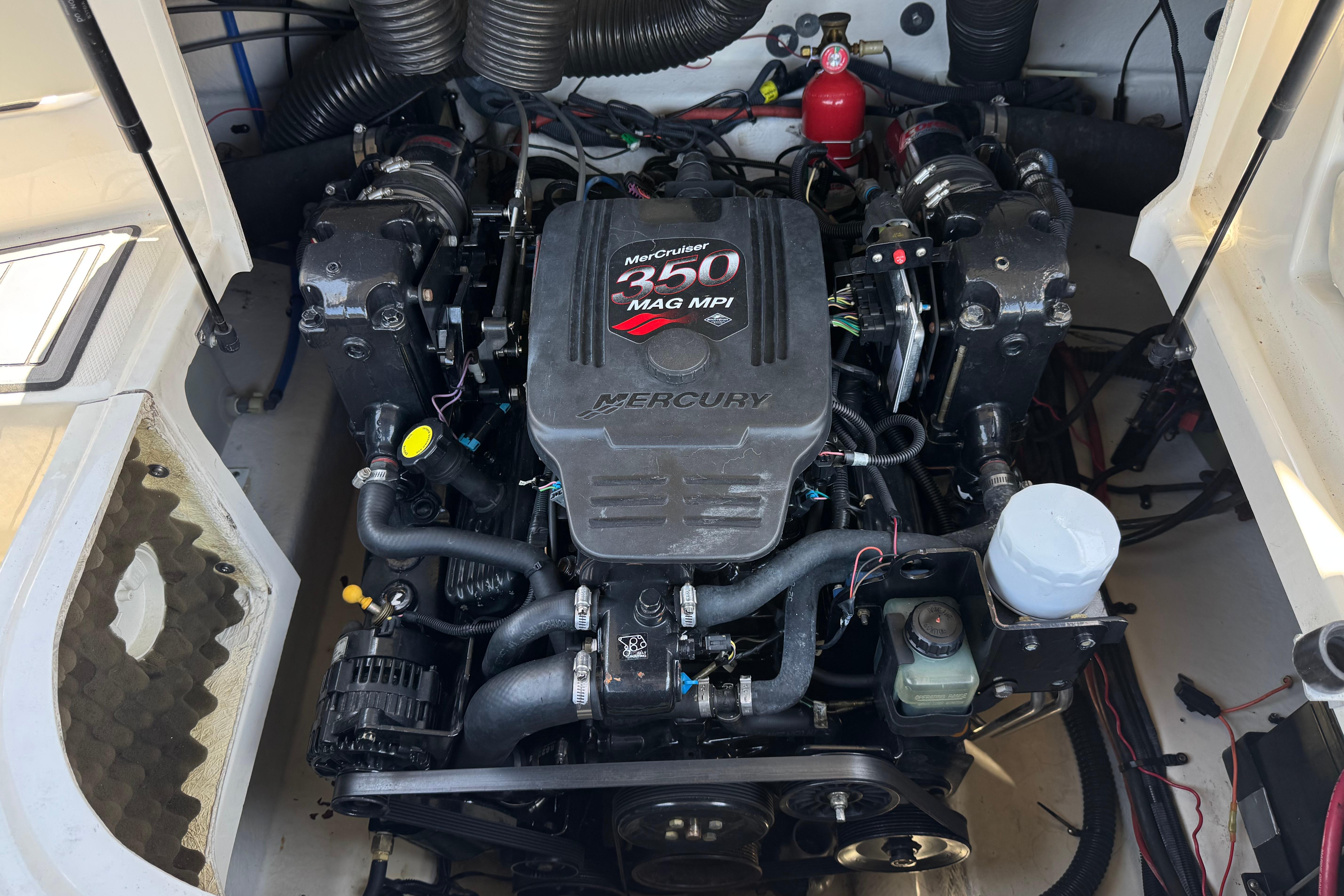Engine compartment of a 2007 Sea Ray 240 Sundeck with MerCruiser 350 MAG MPI engine.