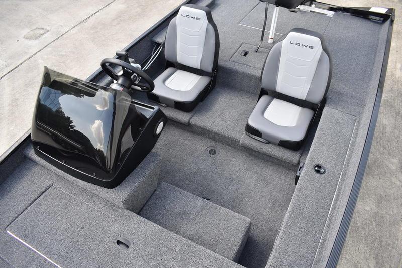 2026 Lowe Skorpion 17 boat interior with dual seats and steering console.