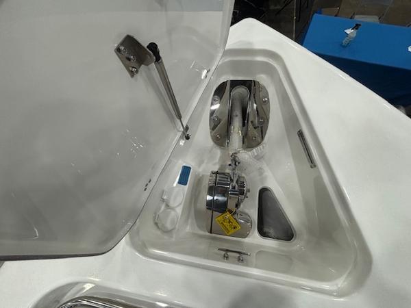 2025 Sea Pro 262 Offshore anchor compartment with open hatch.