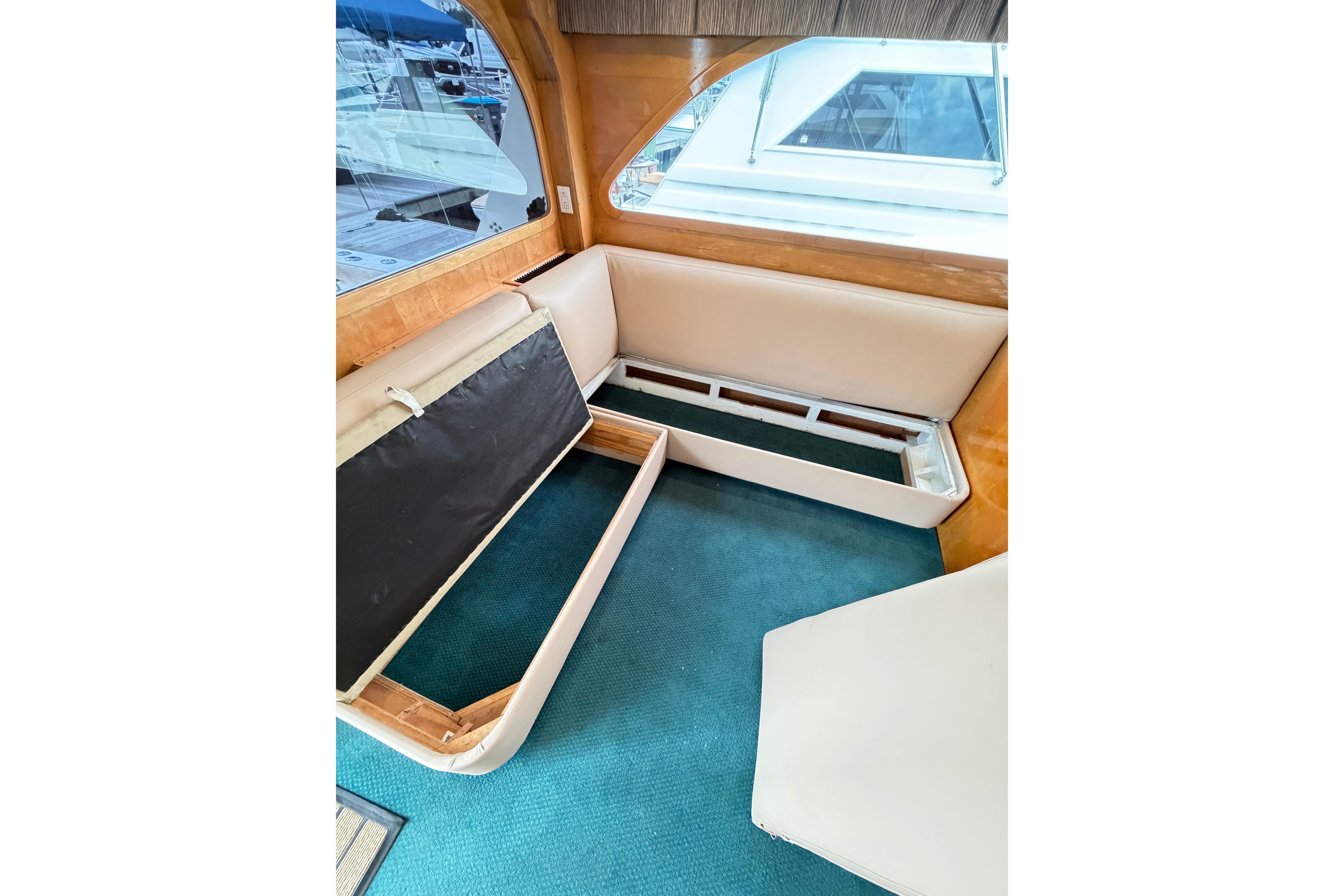 Interior of 1998 Blackwell Custom Carolina Sportfish with open storage under seating.
