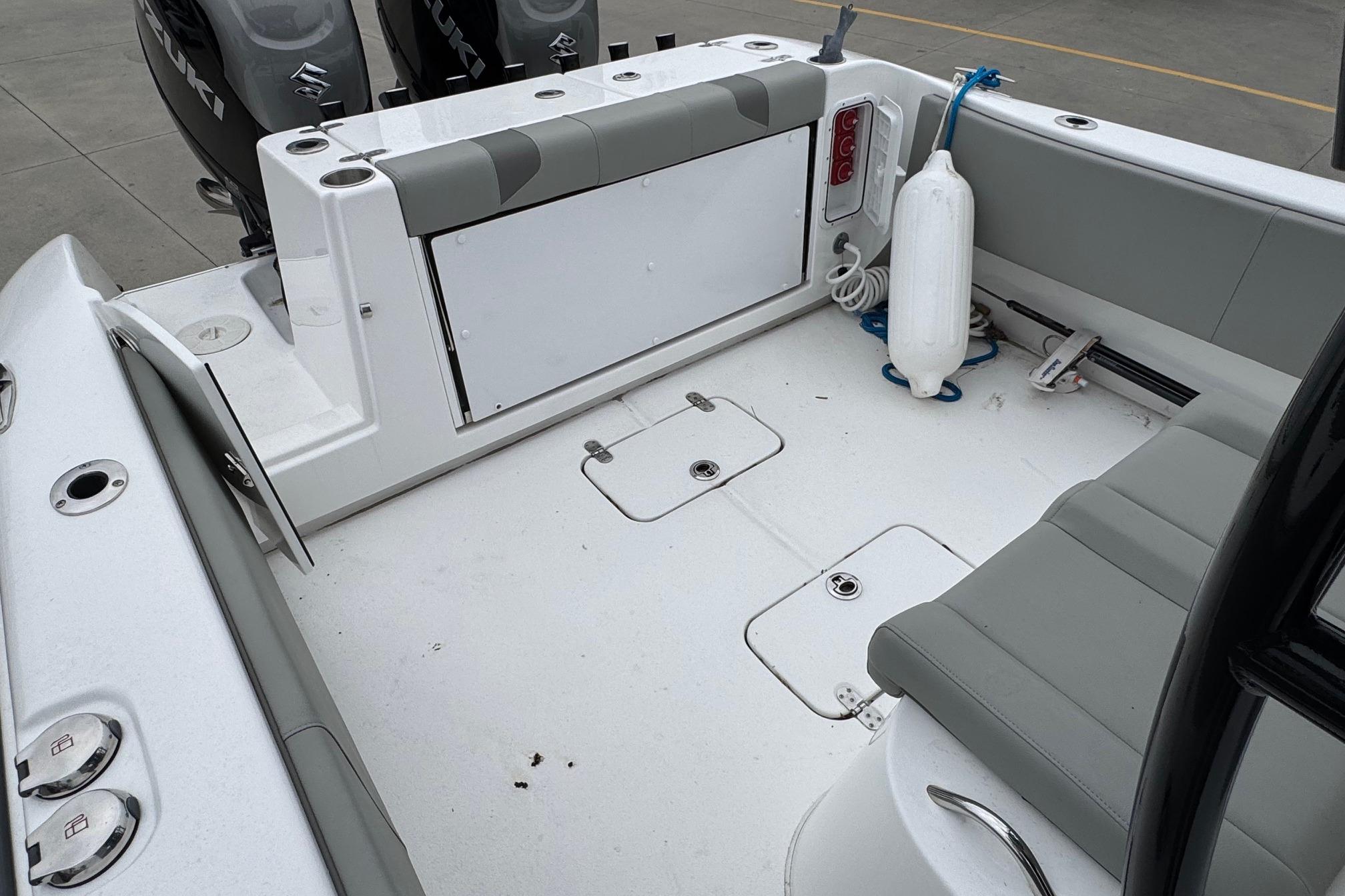 2024 Cape Horn 32 XS boat interior with seating and storage compartments.