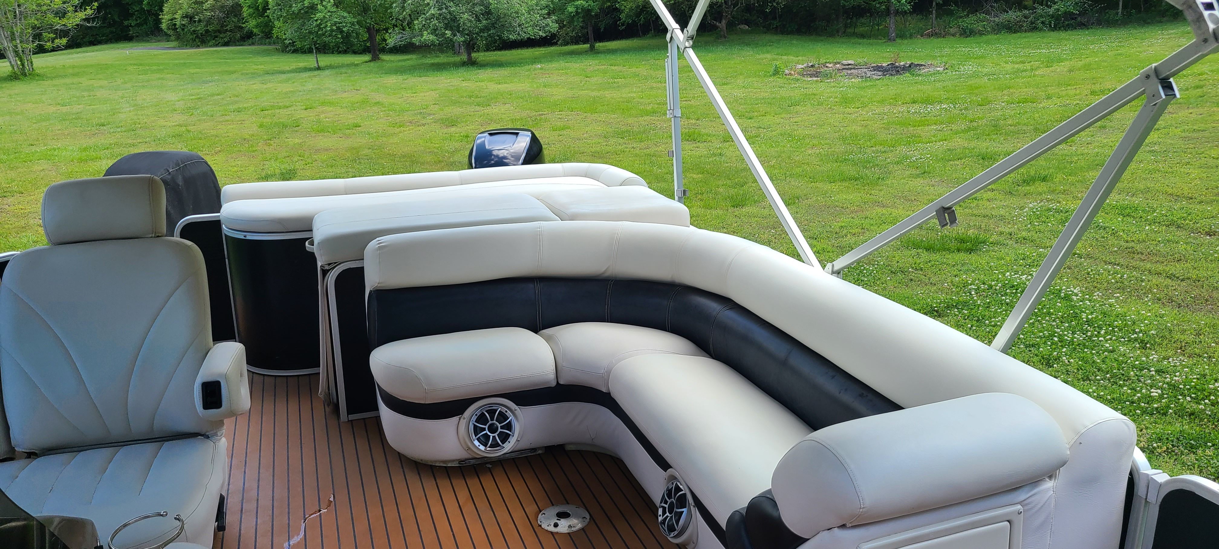 Interior of a 2009 Premier 275 Grand Majestic LTD boat with luxurious seating.