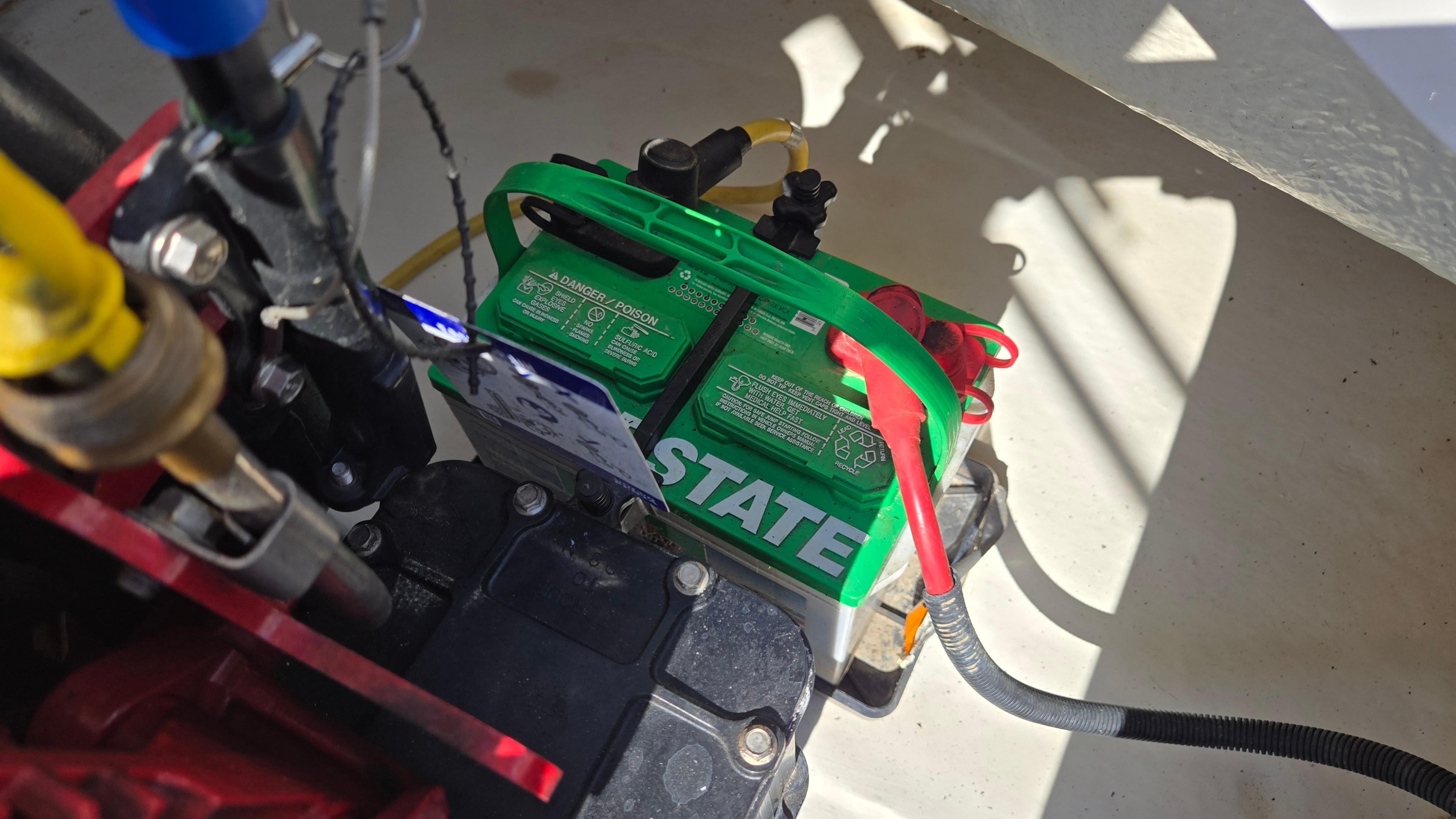 Battery setup in a 2018 Chaparral 224 Sunesta boat engine compartment.