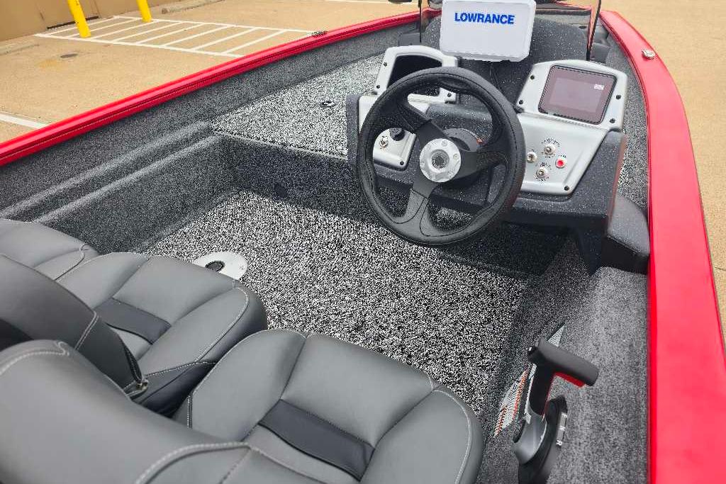 2026 Tracker Pro Team 175 Crappie Edition boat interior with steering wheel and seats.