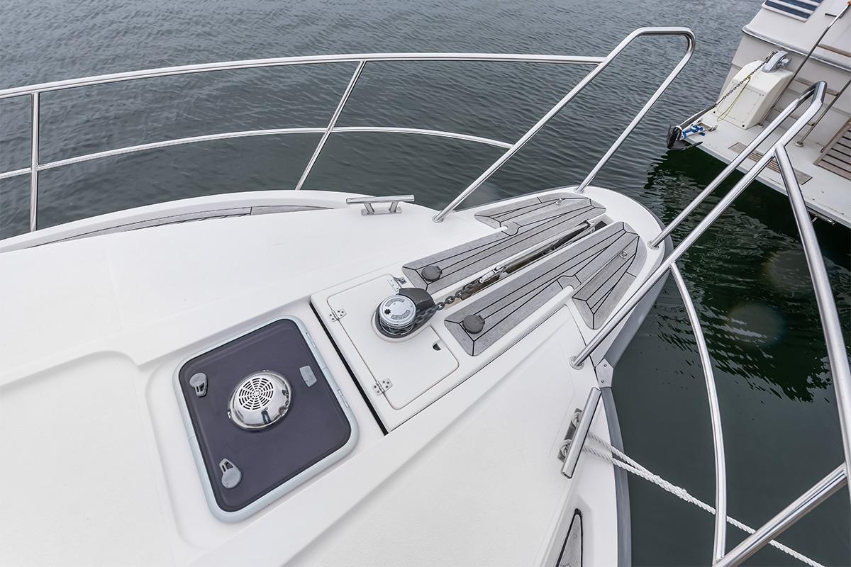 Bow of 2000 Nimbus 380 Carisma yacht with stainless steel railings.