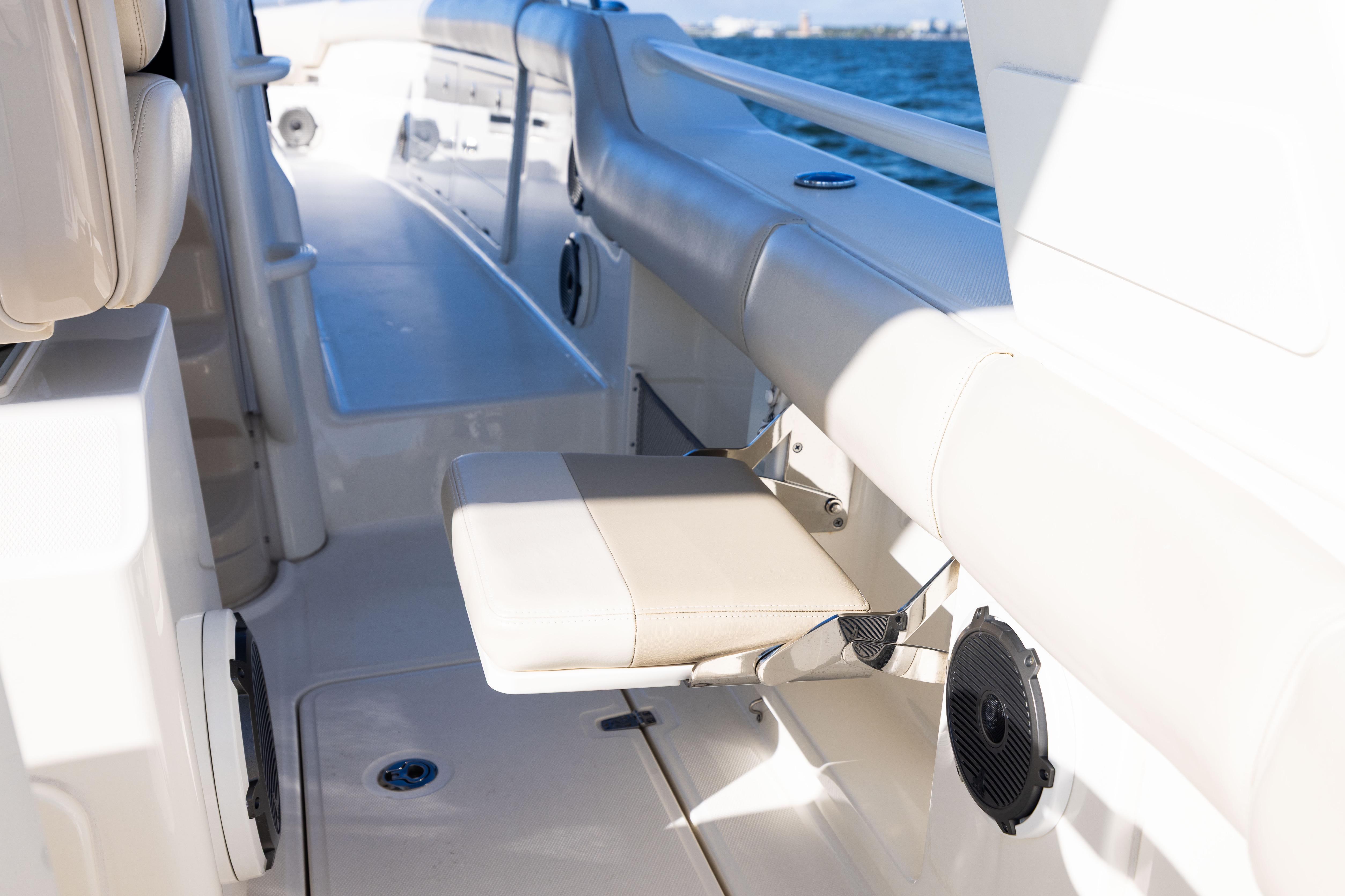 2021 Boston Whaler 420 Outrage interior with seating and speaker detail.
