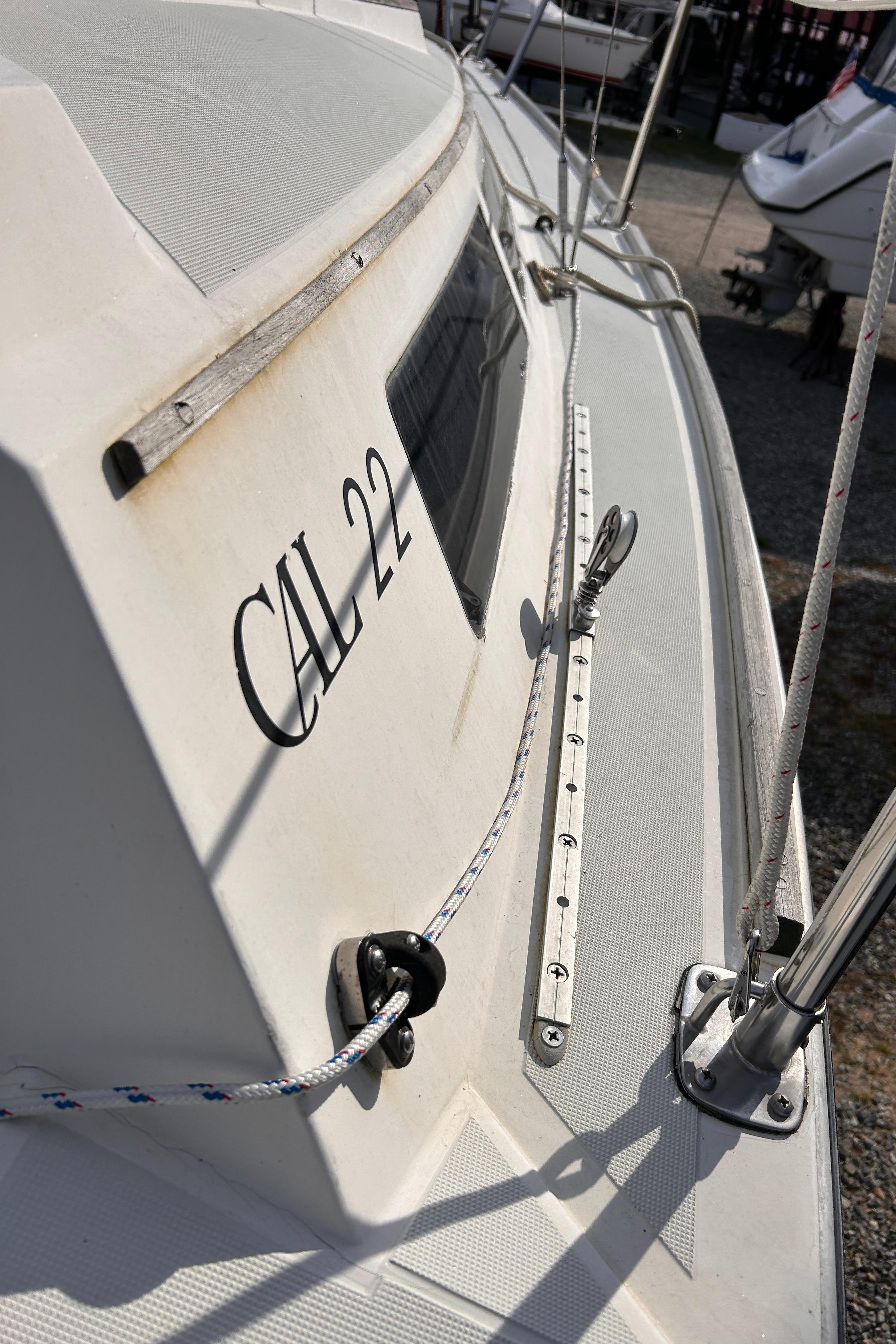 1986 CAL 22 sailboat deck with rigging and logo.