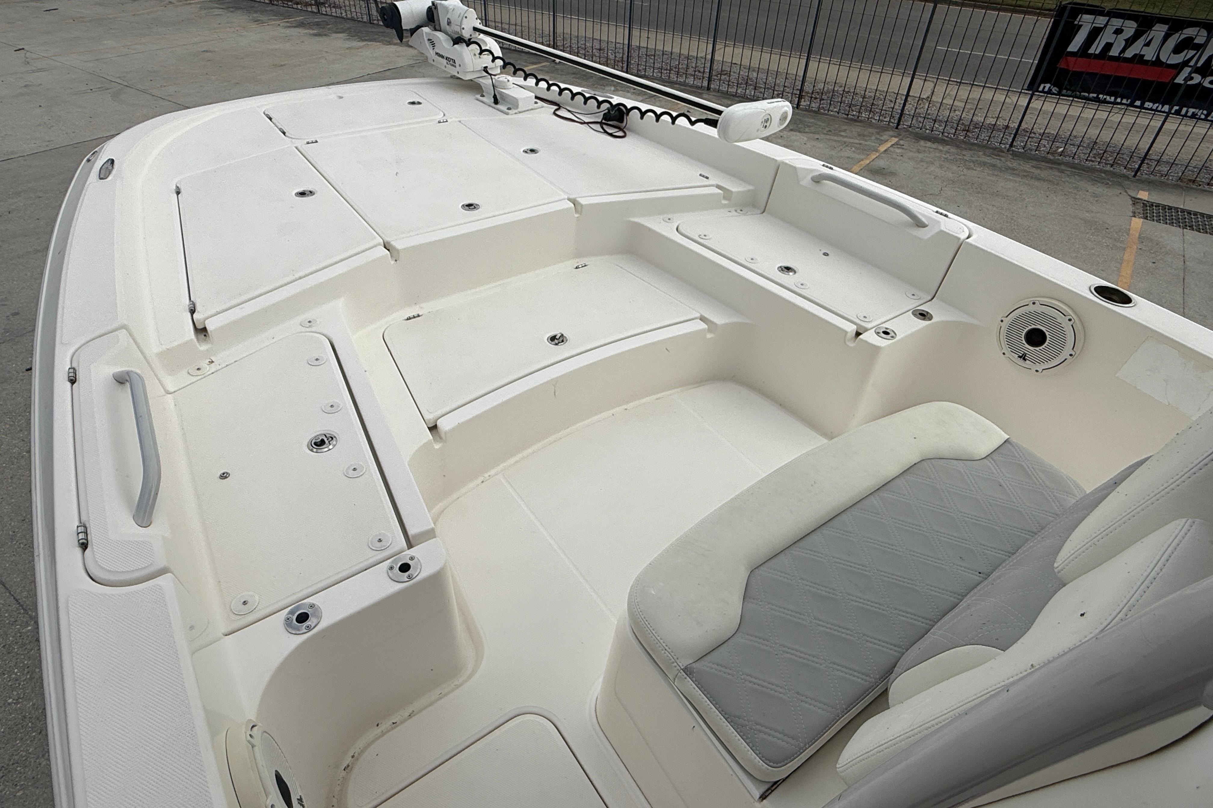 2021 Sea Cat 260 boat deck with seating and storage compartments.