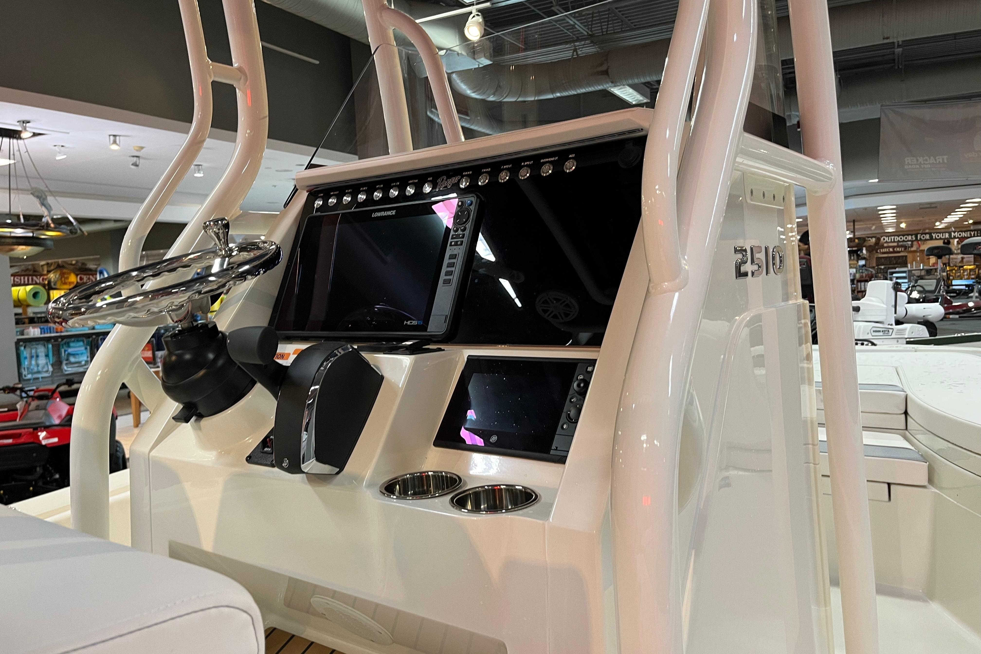 2026 Ranger 2510 Bay boat console with steering wheel and electronic displays.